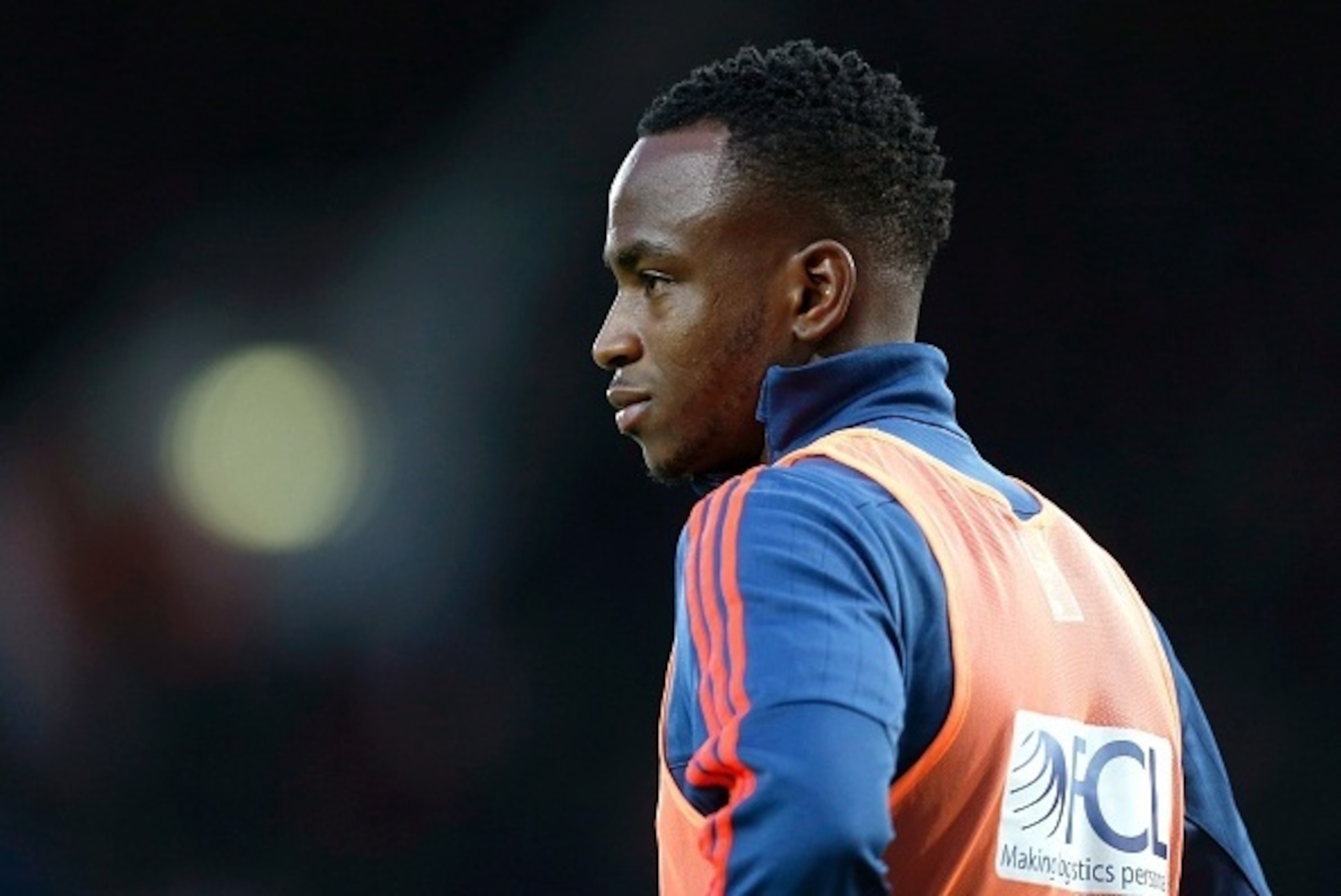 West Bromwich Albion's substitute Saido Berahino watches from the touchline during the English Premier League football match between West Ham United and West Bromwich Albion at The Boleyn Ground in Upton Park, East London on November 29, 2015. The game fi