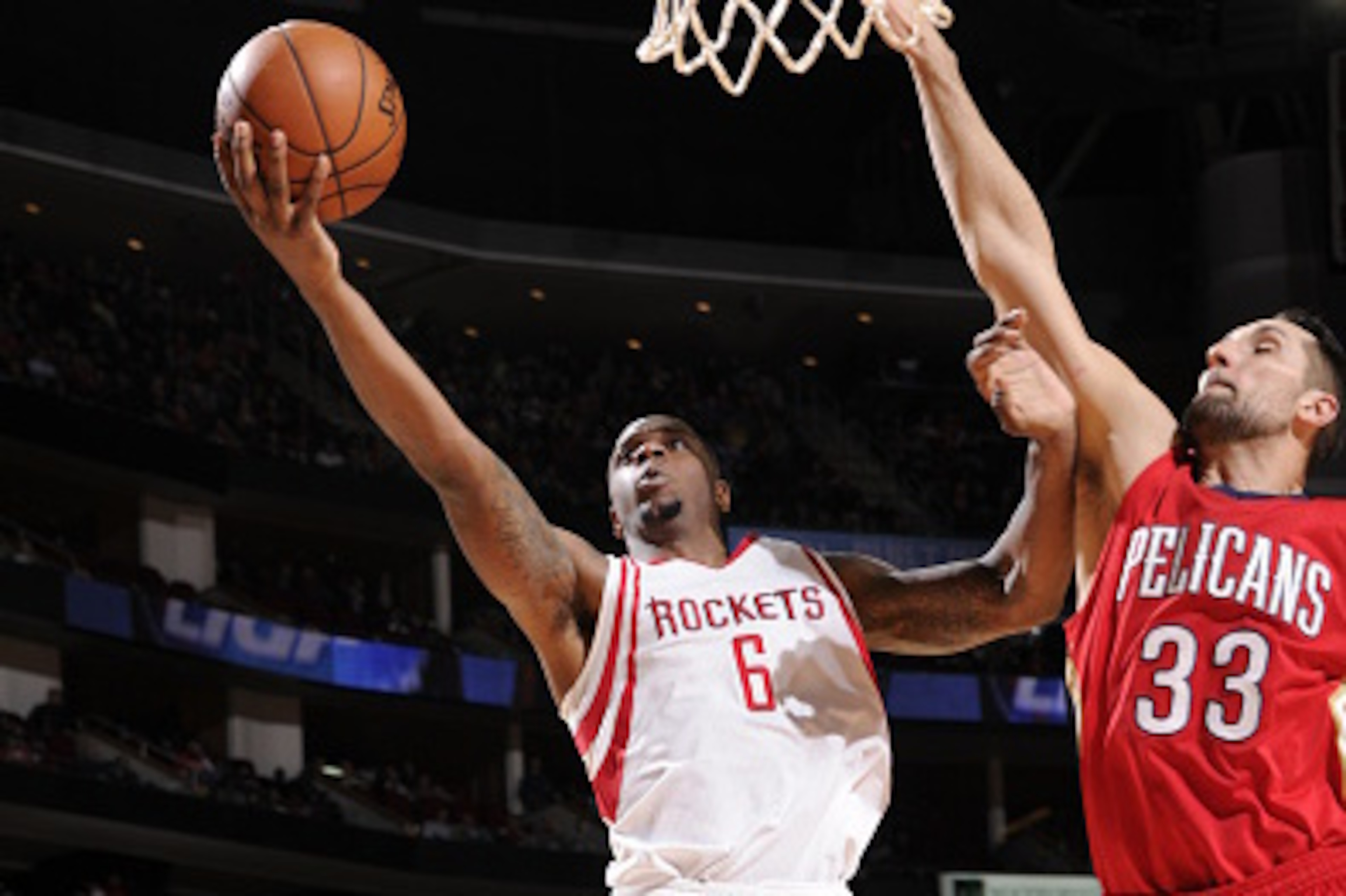 HOUSTON, TX - DECEMBER 2:  Terrence Jones #6 of the Houston Rockets goes to the basket against Ryan Anderson #33 of the New Orleans Pelicans on December 2, 2015 at the Toyota Center in Houston, Texas. NOTE TO USER: User expressly acknowledges and agrees t