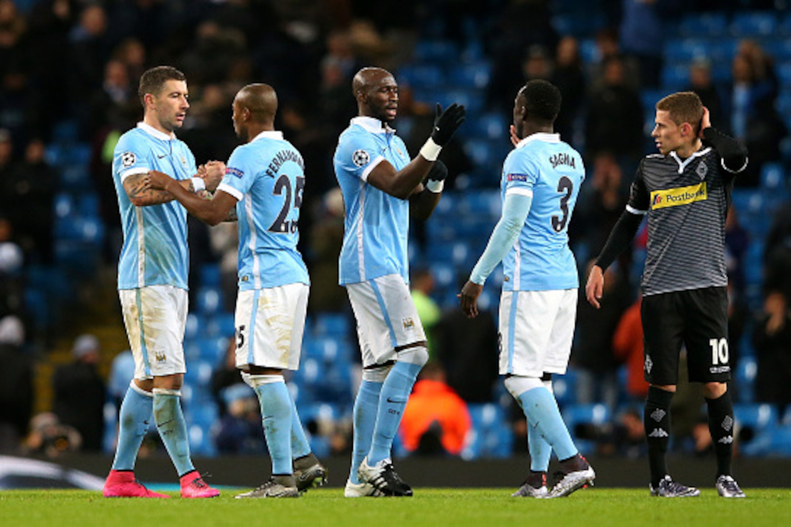 MANCHESTER, ENGLAND - DECEMBER 08:  Manchester City players celebrate after the final whistle during the UEFA Champions League Group D match between Manchester City and Borussia Monchengladbach at Etihad Stadium on December 8, 2015 in Manchester, United K