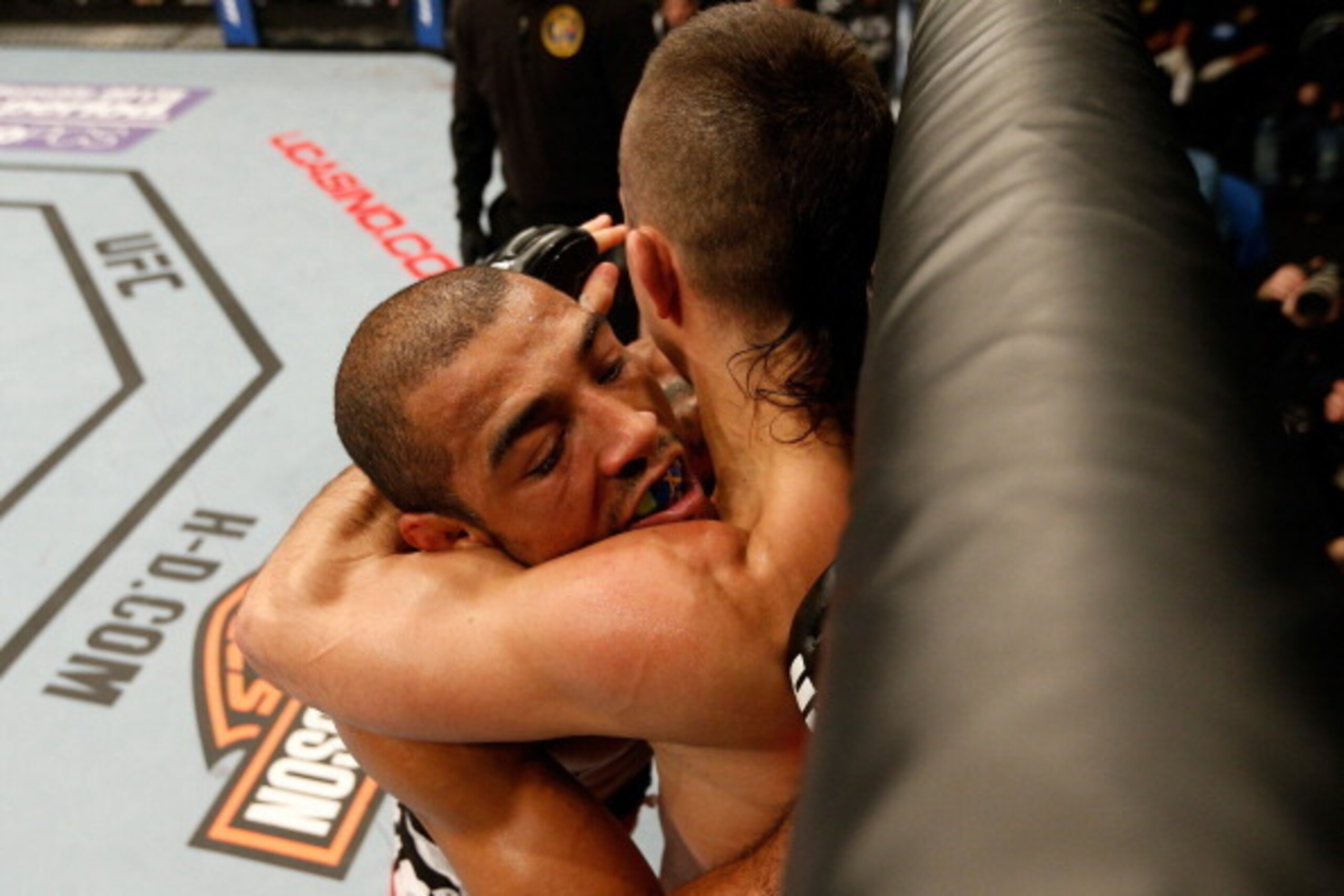 NEWARK, NJ - FEBRUARY 01:  (L-R) Jose Aldo and Ricardo Lamas grapple against the Octagon in their featherweight championship fight at the UFC 169 event inside the Prudential Center on February 1, 2014 in Newark, New Jersey. (Photo by Josh Hedges/Zuffa LLC