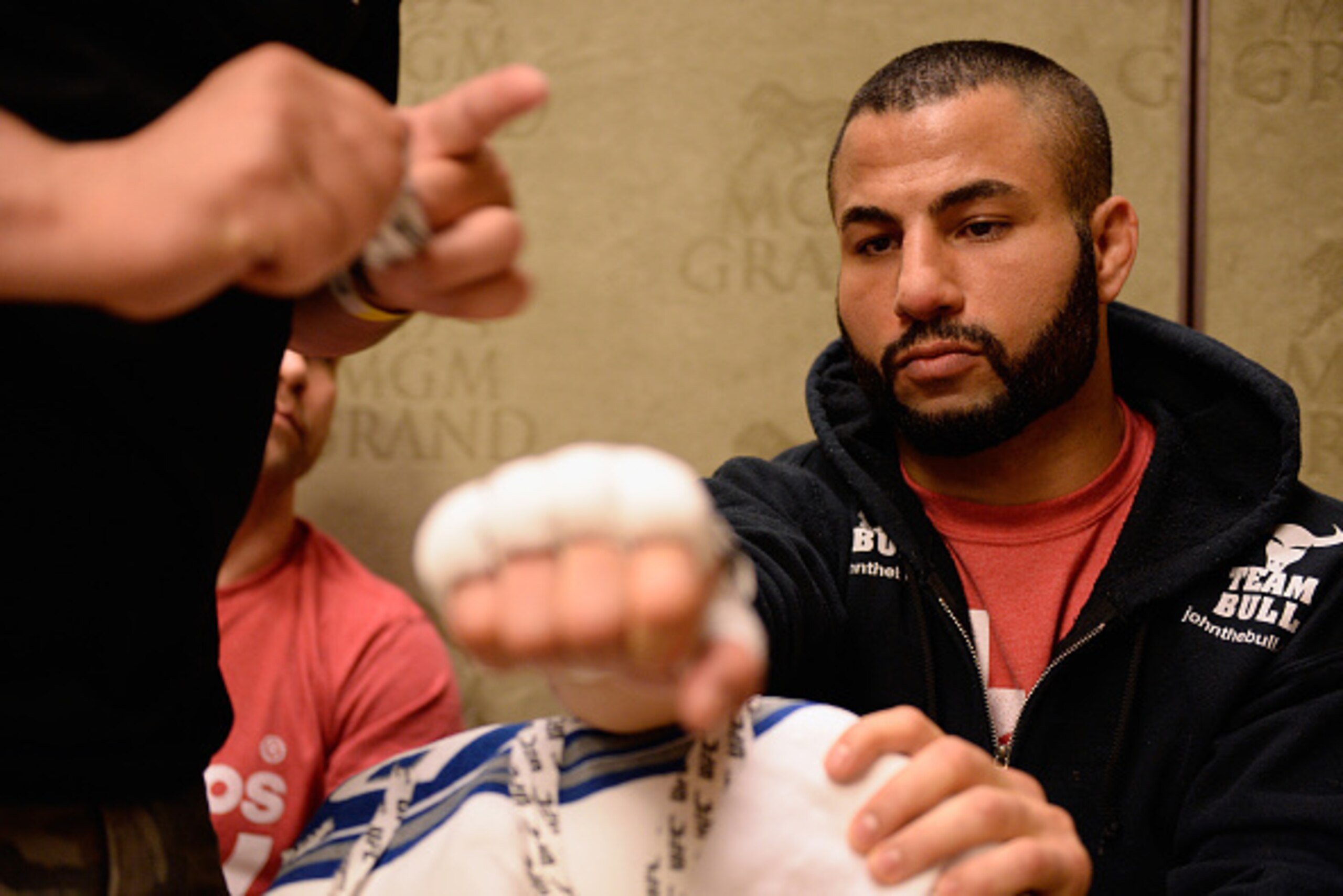 LAS VEGAS, NV - MAY 23:  John Makdessi has his hands taped backstage during the UFC 187 event at the MGM Grand Garden Arena on May 23, 2015 in Las Vegas, Nevada.  (Photo by Mike Roach/Zuffa LLC/Zuffa LLC via Getty Images)