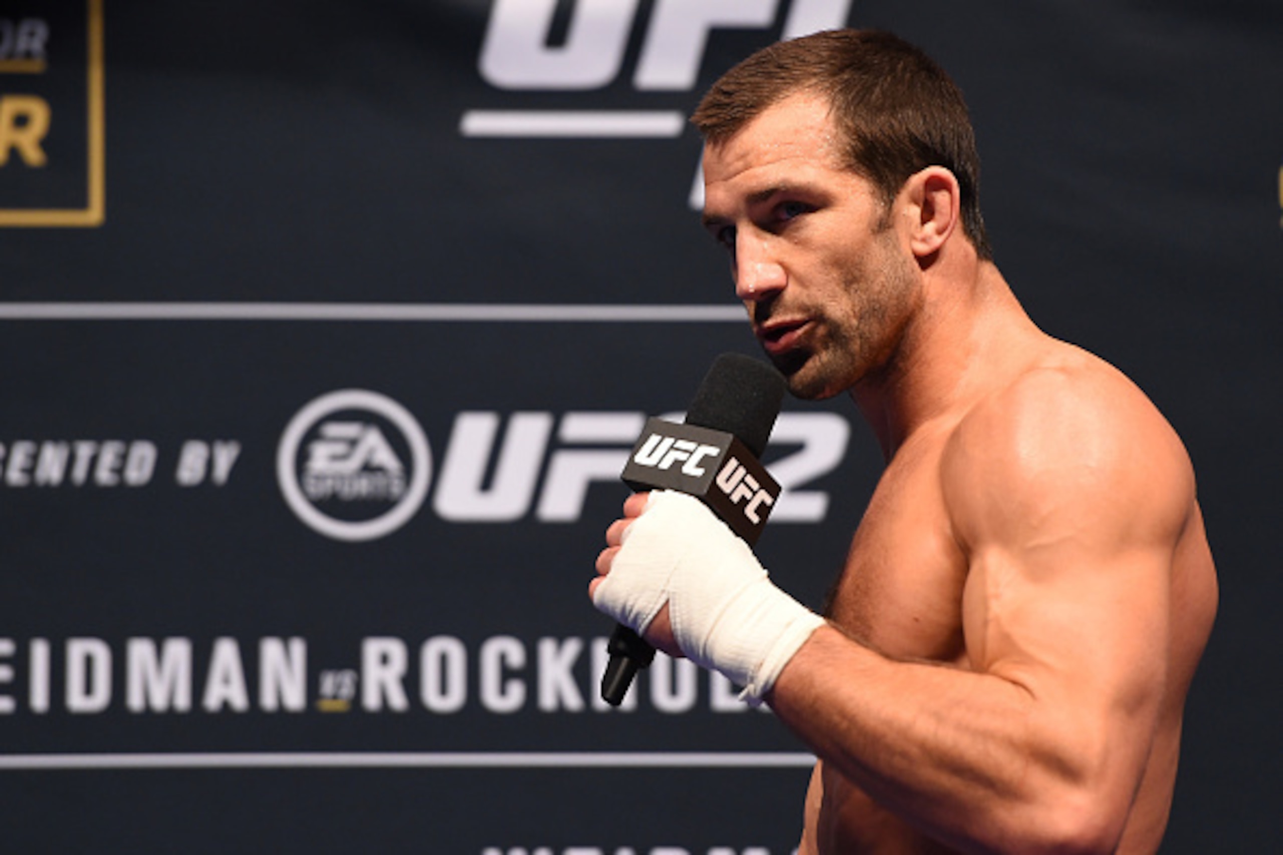 LAS VEGAS, NV - DECEMBER 10:   Luke Rockhold answers questions from the media during the UFC 194 open workouts inside MGM Grand Garden Arena on December 10, 2015 in Las Vegas, Nevada.  (Photo by Josh Hedges/Zuffa LLC/Zuffa LLC via Getty Images)
