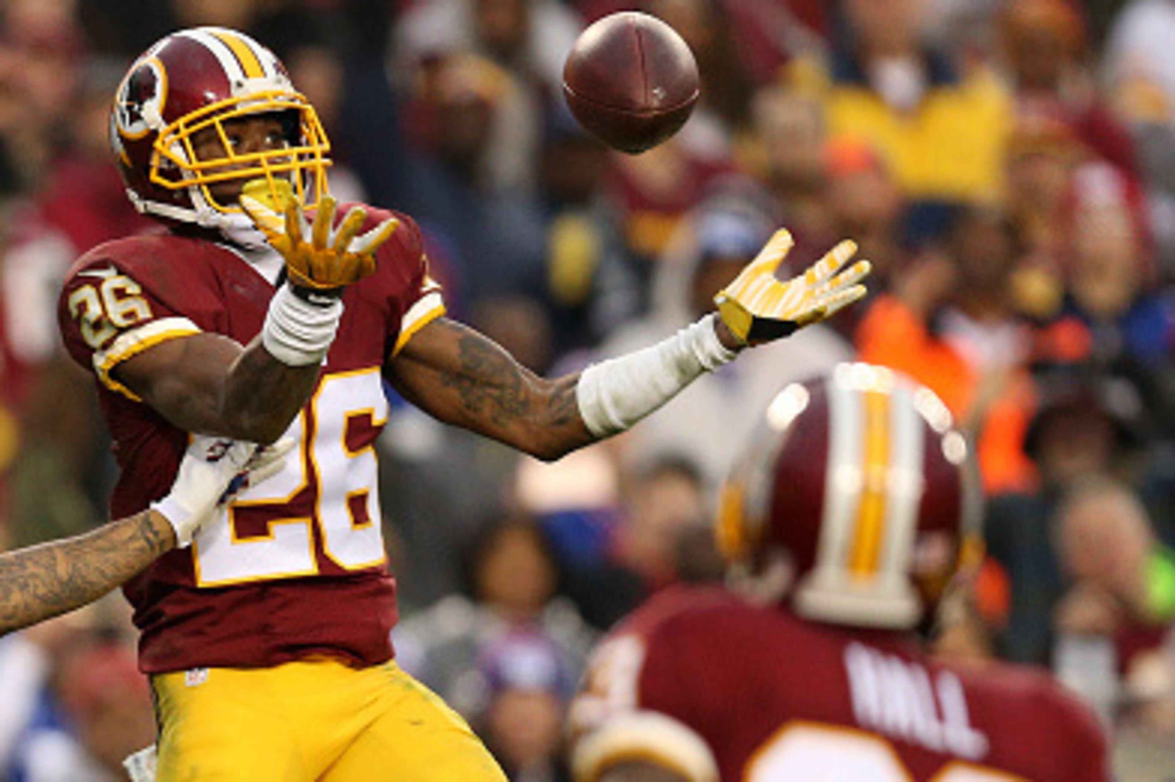 LANDOVER, MD - NOVEMBER 29: Cornerback Bashaud Breeland #26 of the Washington Redskins breaks up a pass intended for wide receiver Odell Beckham #13 of the New York Giants defends in the fourth quarter at FedExField on November 29, 2015 in Landover, Maryl