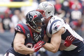 HOUSTON, TX- DECEMBER 01: Nate Solder #77 of the New England Patriots blocks J.J. Watt #99 of the Houston Texans on December 1, 2013 at Reliant Stadium in Houston, Texas. (Photo by Thomas B. Shea/Getty Images)