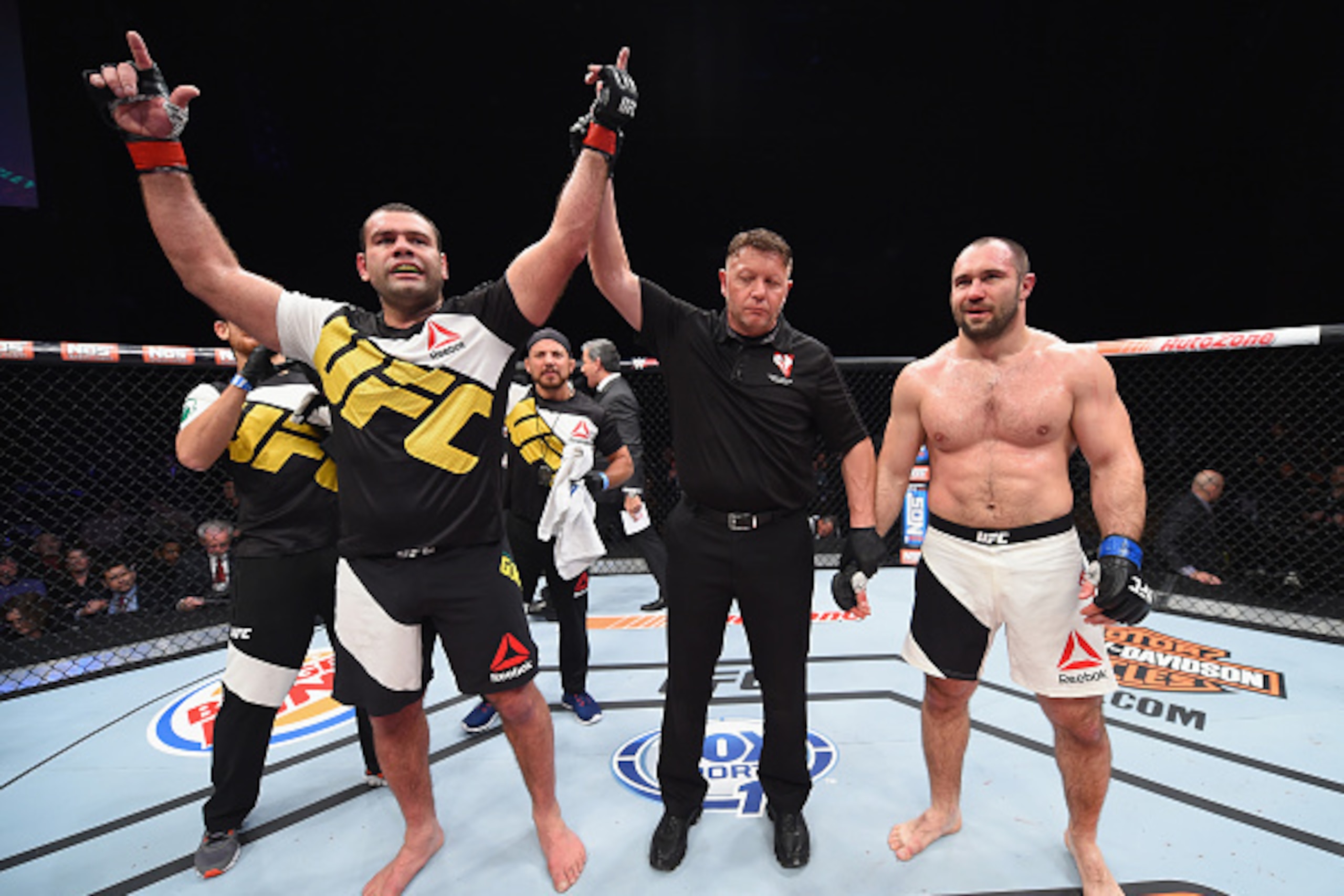 LAS VEGAS, NV - DECEMBER 11: Gabriel Gonzaga (left) is declared the winner against Konstantin Erokhin (right) in their heavyweight bout during the TUF Finale event inside The Chelsea at The Cosmopolitan of Las Vegas on December 11, 2015 in Las Vegas, Neva