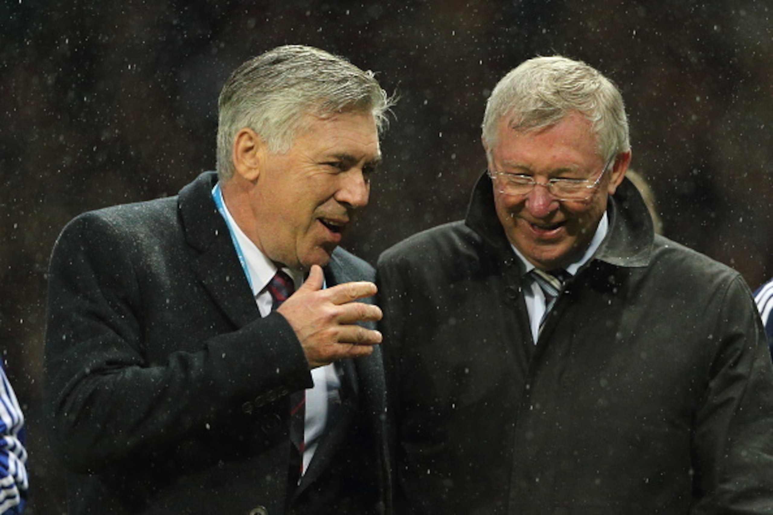 MANCHESTER, ENGLAND - NOVEMBER 14: Carlo Ancelotti the head coach / manager of Rest of the World XI and Sir Alex Ferguson the head coach / manager of Great Britain and Ireland XI during the David Beckham Match for Children in aid of UNICEF at Old Trafford MANCHESTER, ENGLAND - NOVEMBER 14: Carlo Ancelotti the head coach / manager of Rest of the World XI and Sir Alex Ferguson the head coach / manager of Great Britain and Ireland XI during the David Beckham Match for Children in aid of UNICEF at Old Trafford