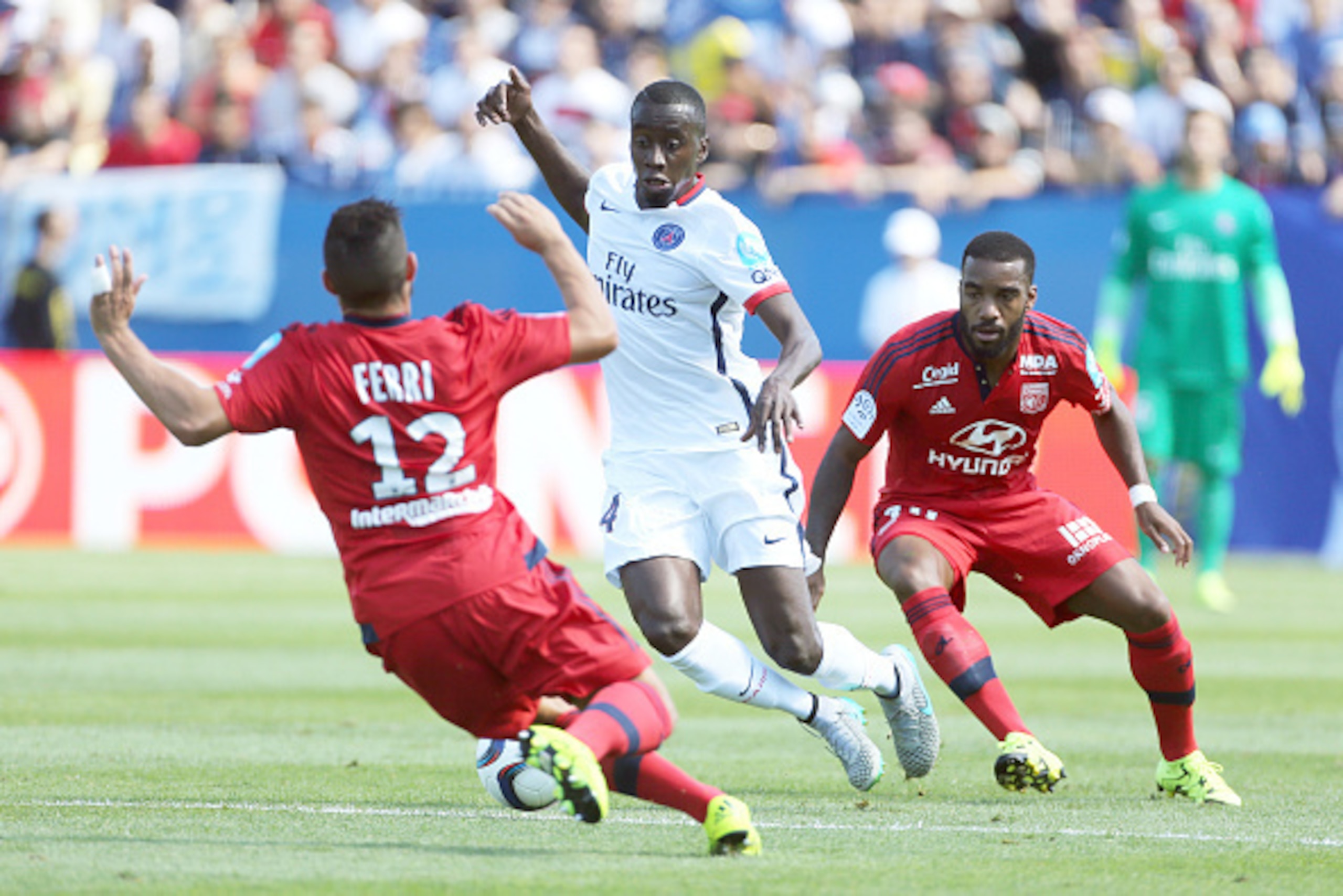 MONTREAL, QC - AUGUST 1: Blaise Matuidi of PSG and Alexandre Lacazette of Lyon in action during the 2015 Trophee des Champions between Paris Saint-Germain (PSG) and Olympique Lyonnais (OL) at Stade Saputo on August 1, 2015 in Montreal, Quebec, Canada. (P MONTREAL, QC - AUGUST 1: Blaise Matuidi of PSG and Alexandre Lacazette of Lyon in action during the 2015 Trophee des Champions between Paris Saint-Germain (PSG) and Olympique Lyonnais (OL) at Stade Saputo on August 1, 2015 in Montreal, Quebec, Canada. (P