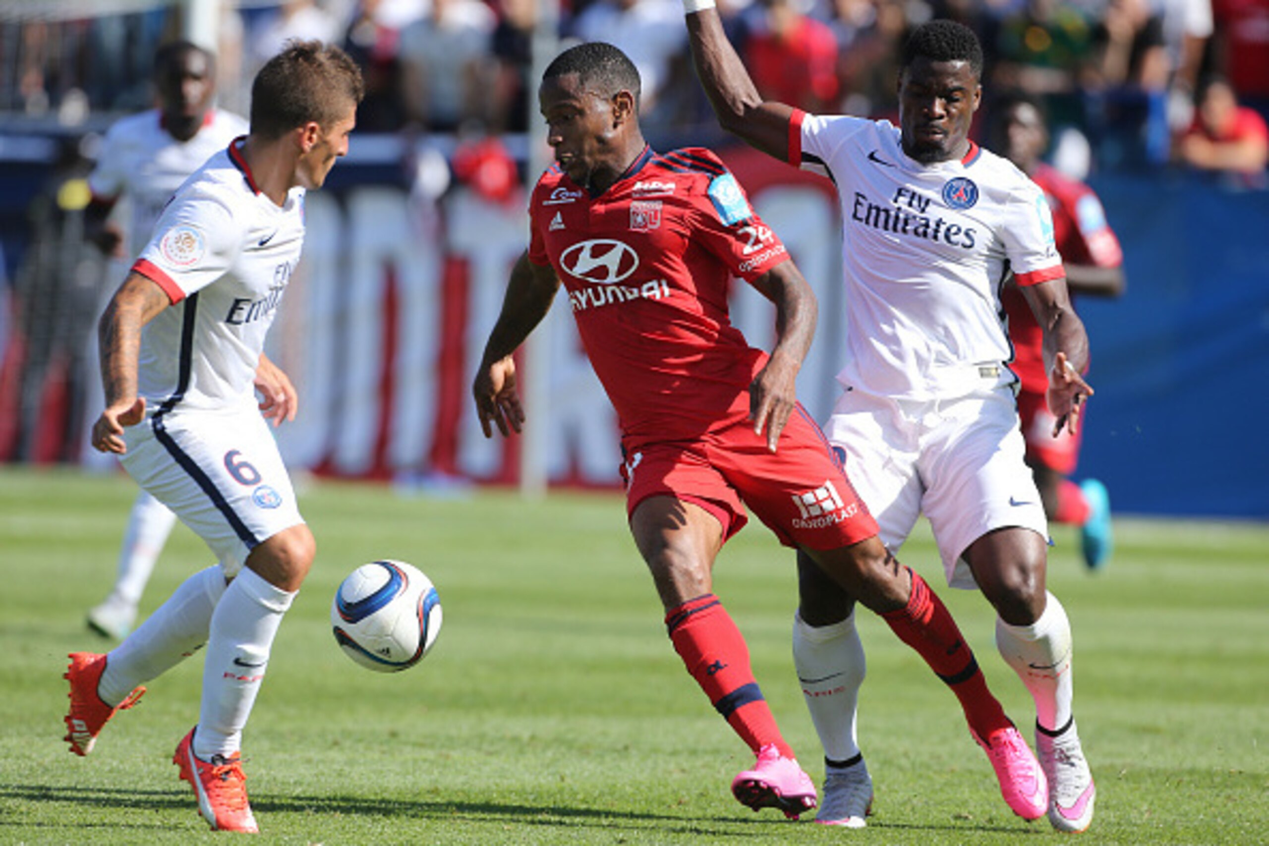 MONTREAL, QC - AUGUST 1: Claudio Beauvue of Lyon in action between Marco Verratti and Serge Aurier of PSG during the 2015 Trophee des Champions between Paris Saint-Germain (PSG) and Olympique Lyonnais (OL) at Stade Saputo on August 1, 2015 in Montreal, Q MONTREAL, QC - AUGUST 1: Claudio Beauvue of Lyon in action between Marco Verratti and Serge Aurier of PSG during the 2015 Trophee des Champions between Paris Saint-Germain (PSG) and Olympique Lyonnais (OL) at Stade Saputo on August 1, 2015 in Montreal, Q
