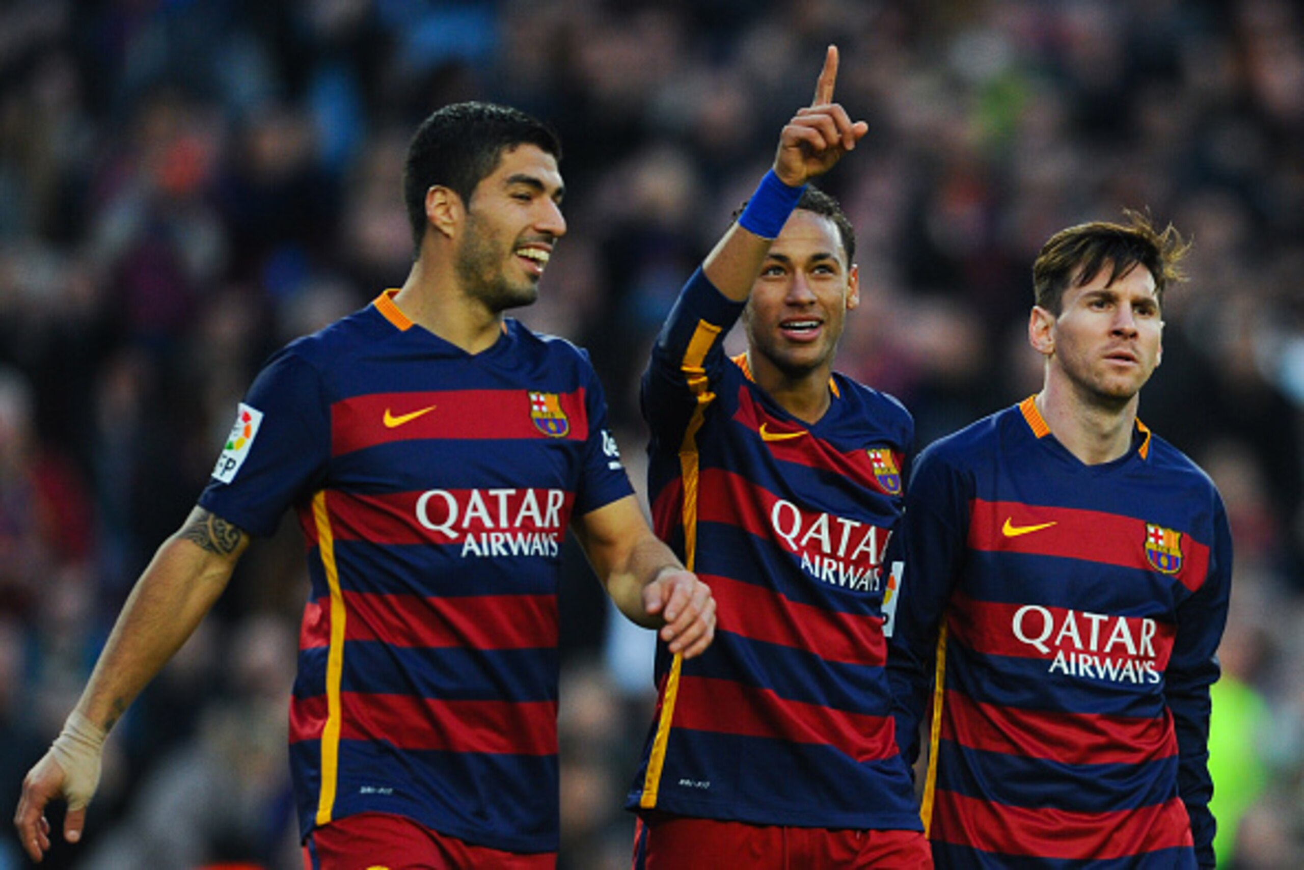 BARCELONA, SPAIN - NOVEMBER 28:  Neymar (C) of FC Barcelona celebrates with his teammates Luis Suarez (L) and Lionel Messi of FC Barcelonaa after scoring his team's third goal of FC Barcelonaduring the La Liga match between FC Barcelona and Real Sociedad 