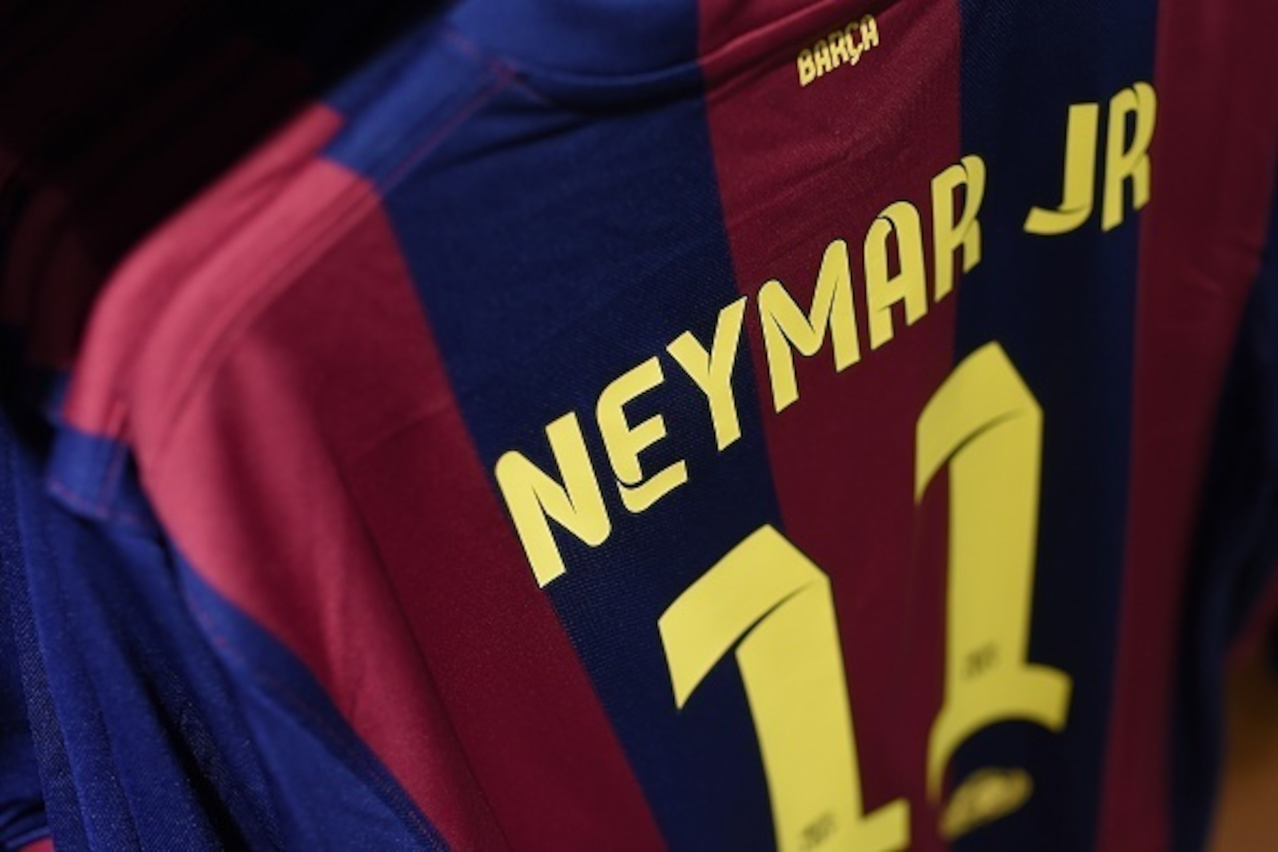 Picture shows a football  jersey with the name of Barcelona's Brazilian forward Neymar da Silva Santos Junior at the FC Barcelona's store at the Camp Nou stadium in Barcelona on March 13, 2015. A Spanish judge today upheld a tax fraud case against FC Barc