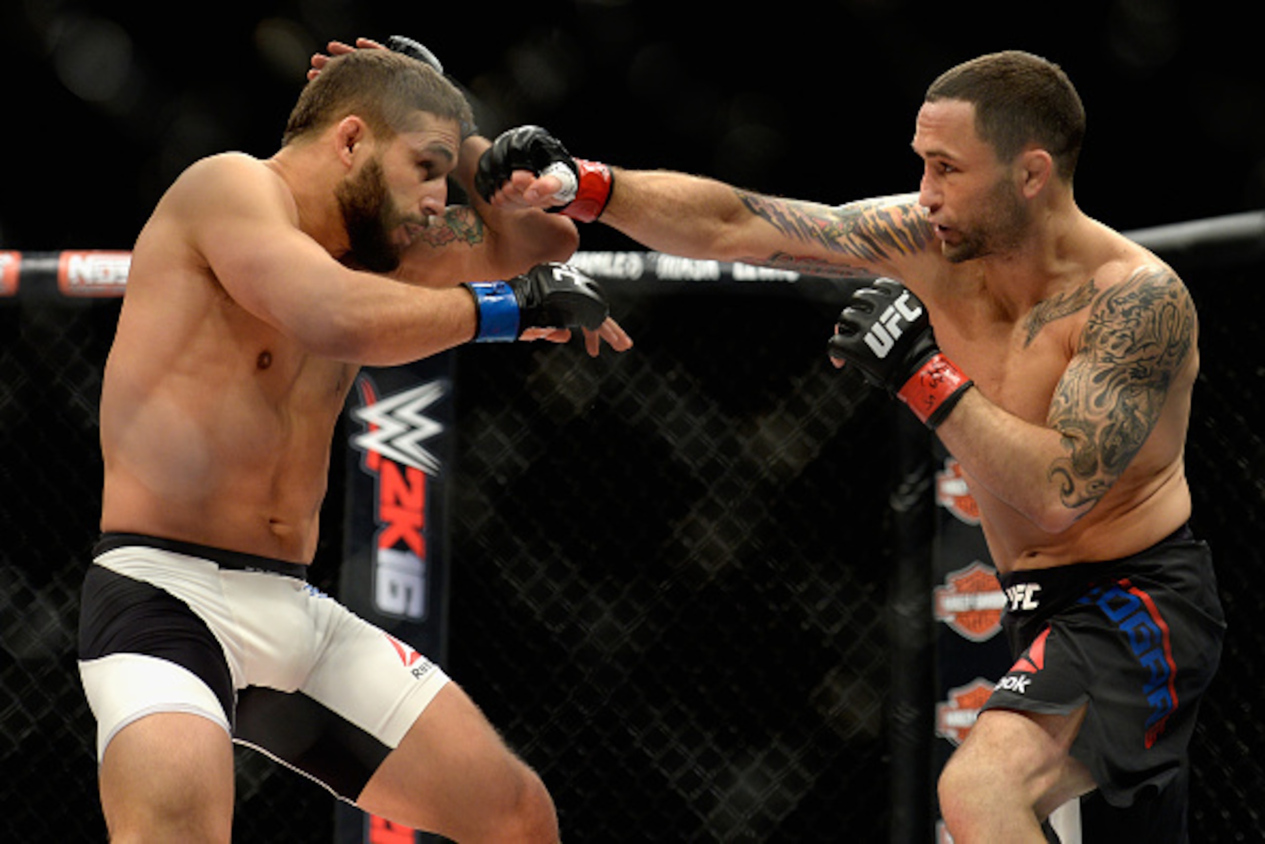 LAS VEGAS, NV - DECEMBER 11: (R-L) Frankie Edgar punches Chad Mendes in their featherweight bout during the TUF Finale event inside The Chelsea at The Cosmopolitan of Las Vegas on December 11, 2015 in Las Vegas, Nevada.  (Photo by Brandon Magnus/Zuffa LLC