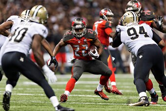 NEW ORLEANS, LA - SEPTEMBER 20:  Doug Martin #22 of the Tampa Bay Buccaneers runs the ball during a game against the New Orleans Saints at Mercedes-Benz Superdome on September 20, 2015 in New Orleans Louisiana.  The Buccaneers defeated the Saints 26-19.  