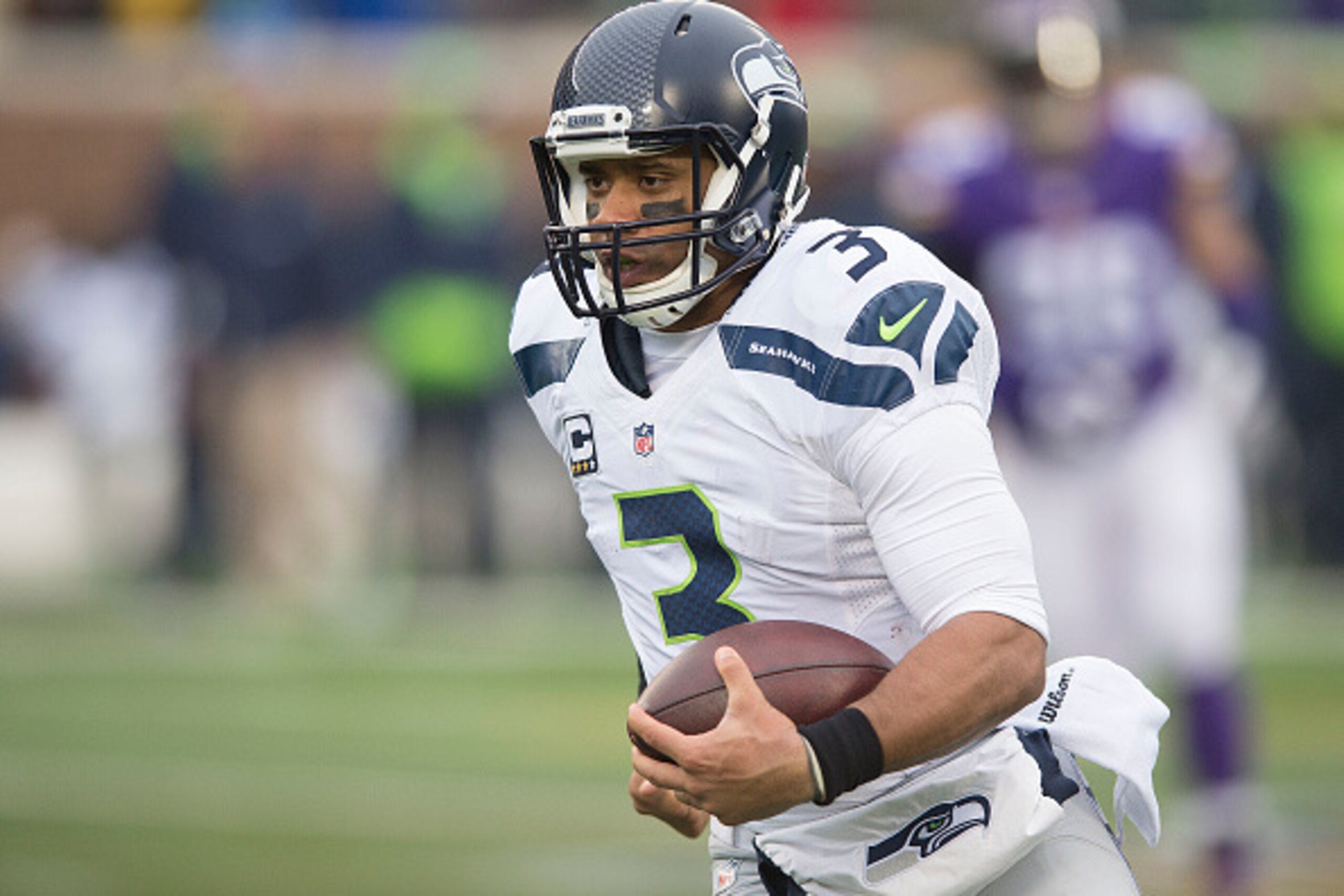MINNEAPOLIS, MN - DECEMBER 6: Russell Wilson #3 of the Seattle Seahawks scrambles during an NFL game against the Minnesota Vikings at TCF Bank Stadium December 6, 2015 in Minneapolis, Minnesota.  (Photo by Tom Dahlin/Getty Images)