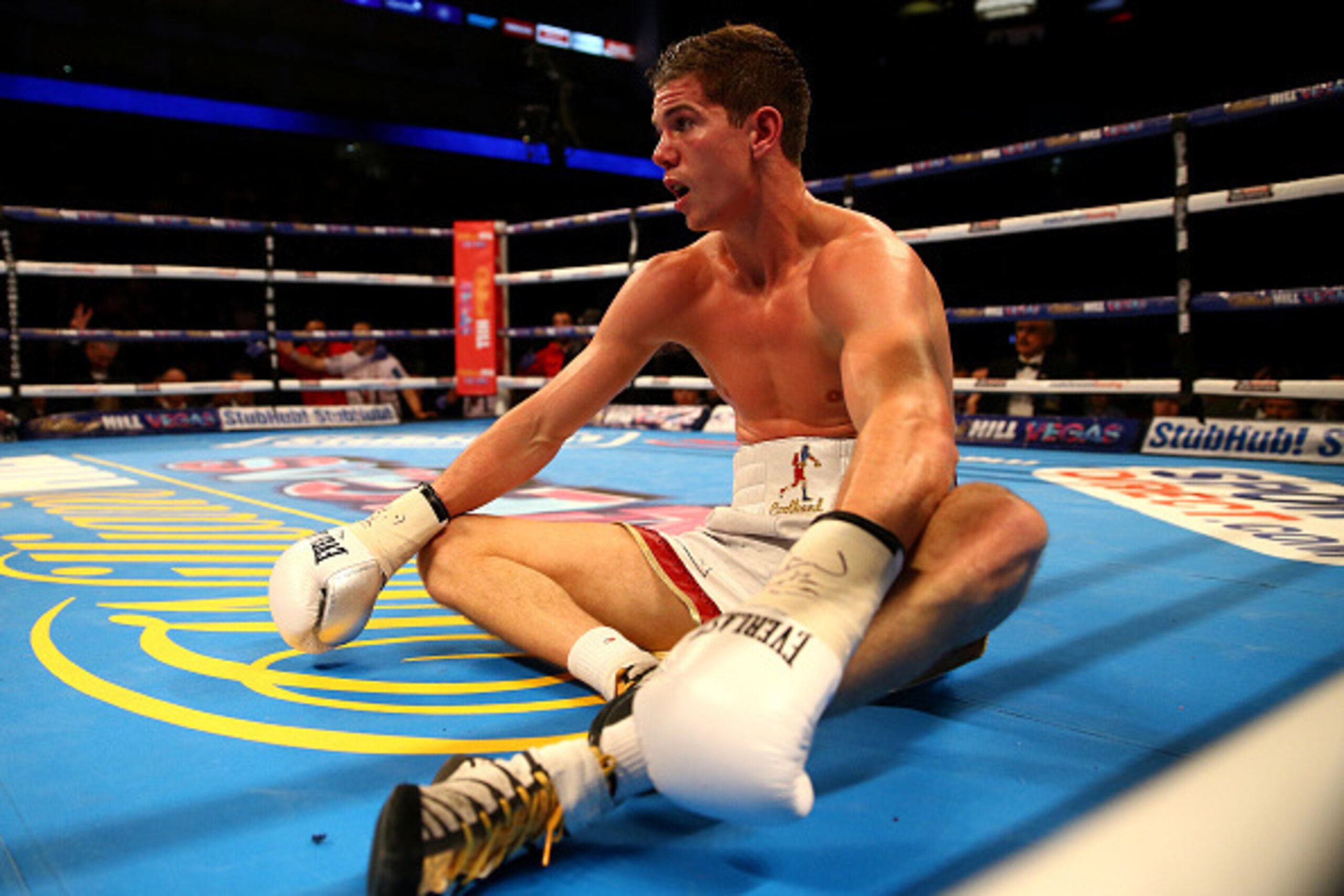 LONDON, ENGLAND - DECEMBER 12:  Luke Campbell sits on the canvas after being put down by Yvan Mendy in the WBC International Lightweight Championship fight during the Matchroom Boxing promotion 'Bad Intentions' at The O2 Arena on December 12, 2015 in Lond