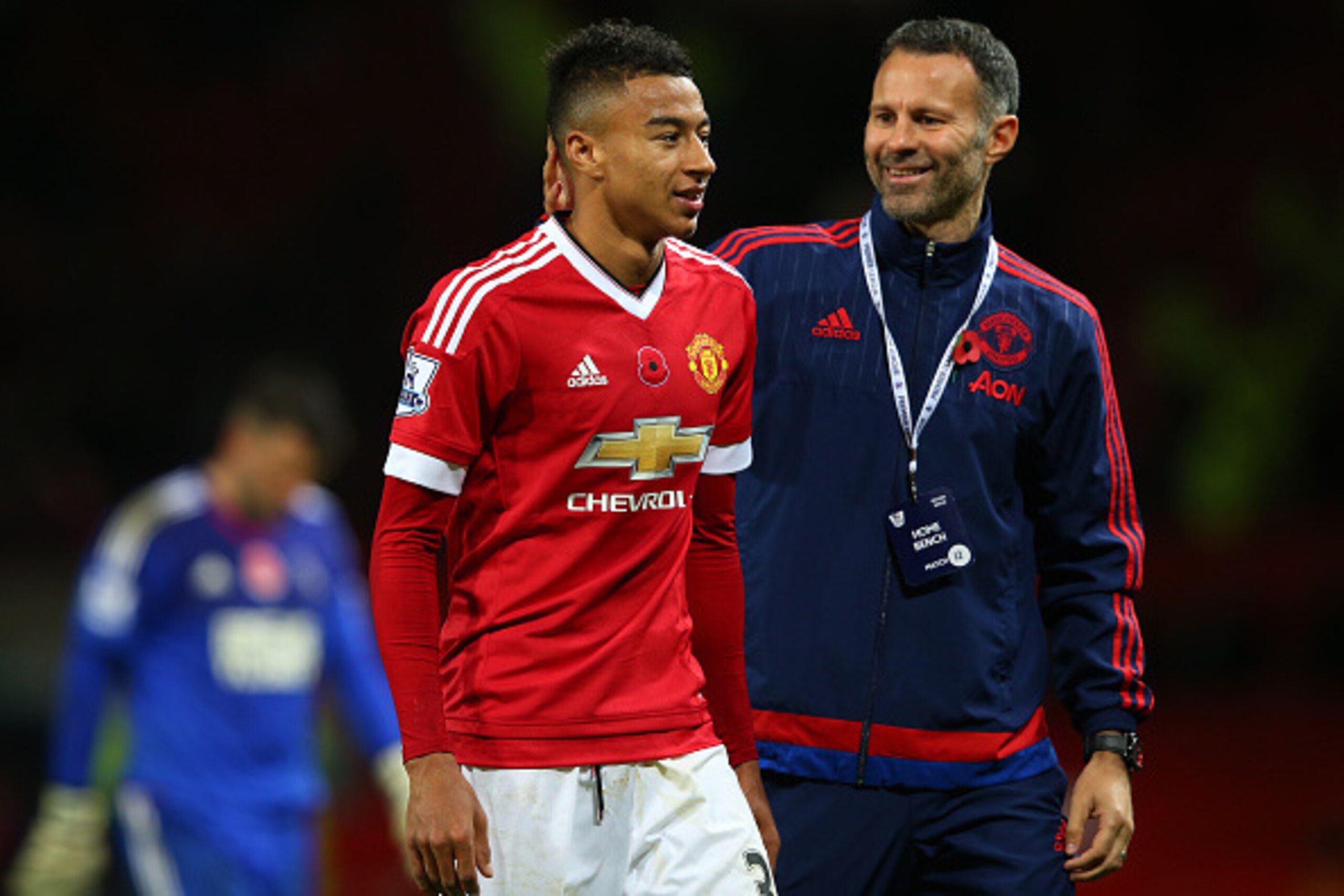 MANCHESTER, ENGLAND - NOVEMBER 07: Jesse Lingard (L) of Manchester United is congratulated by assistant manager Ryan Giggs (R) during the Barclays Premier League match between Manchester United and West Bromwich Albion at Old Trafford on November 7, 2015 