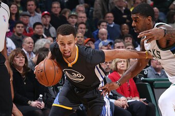 Milwaukee, WI - DECEMBER 12: Stephen Curry #30 of the Golden State Warriors drives to the basket during the game against the Milwaukee Bucks on December 12, 2015 at the BMO Harris Bradley Center in Milwaukee, Wisconsin. NOTE TO USER: User expressly acknow