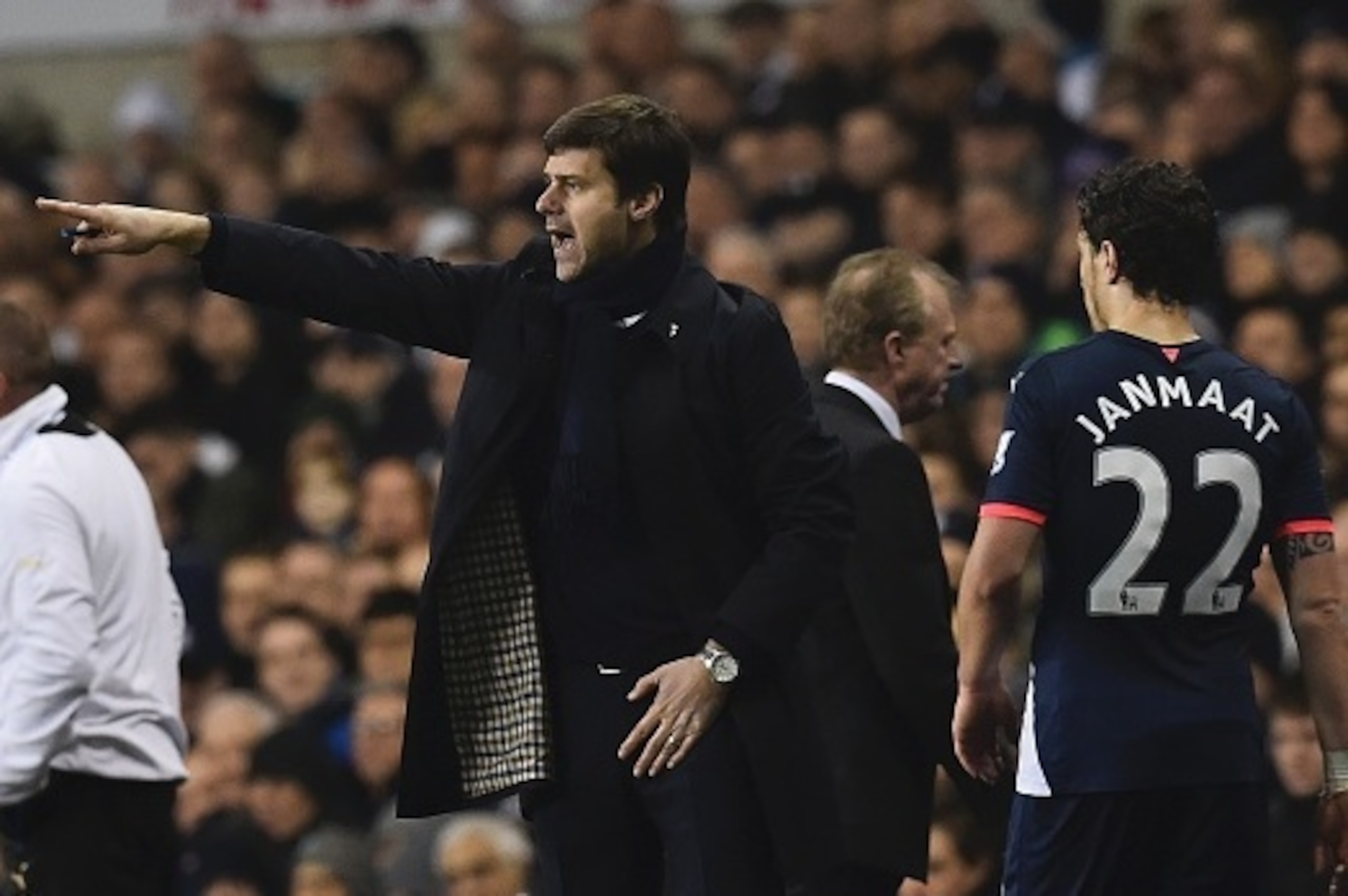 Tottenham Hotspur's Argentinian head coach Mauricio Pochettino (C) gestures on the touchline during the English Premier League football match between Tottenham Hotspur and Newcastle United at White Hart Lane in north London on December 13, 2015. AFP PHOTO