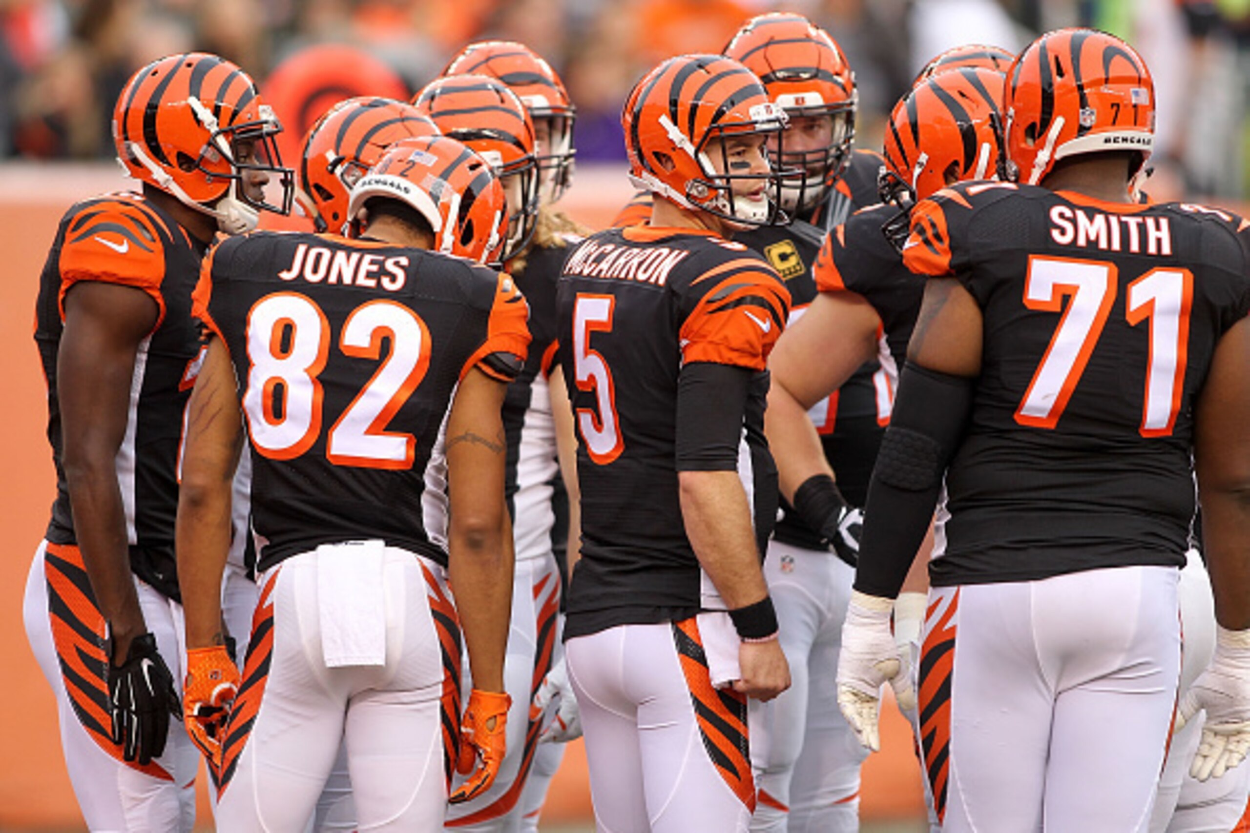 CINCINNATI, OH - DECEMBER 13:  AJ McCarron #5 of the Cincinnati Bengals calls a play in the huddle during the second quarter of the game against the Pittsburgh Steelers at Paul Brown Stadium on December 13, 2015 in Cincinnati, Ohio. (Photo by John Griesho