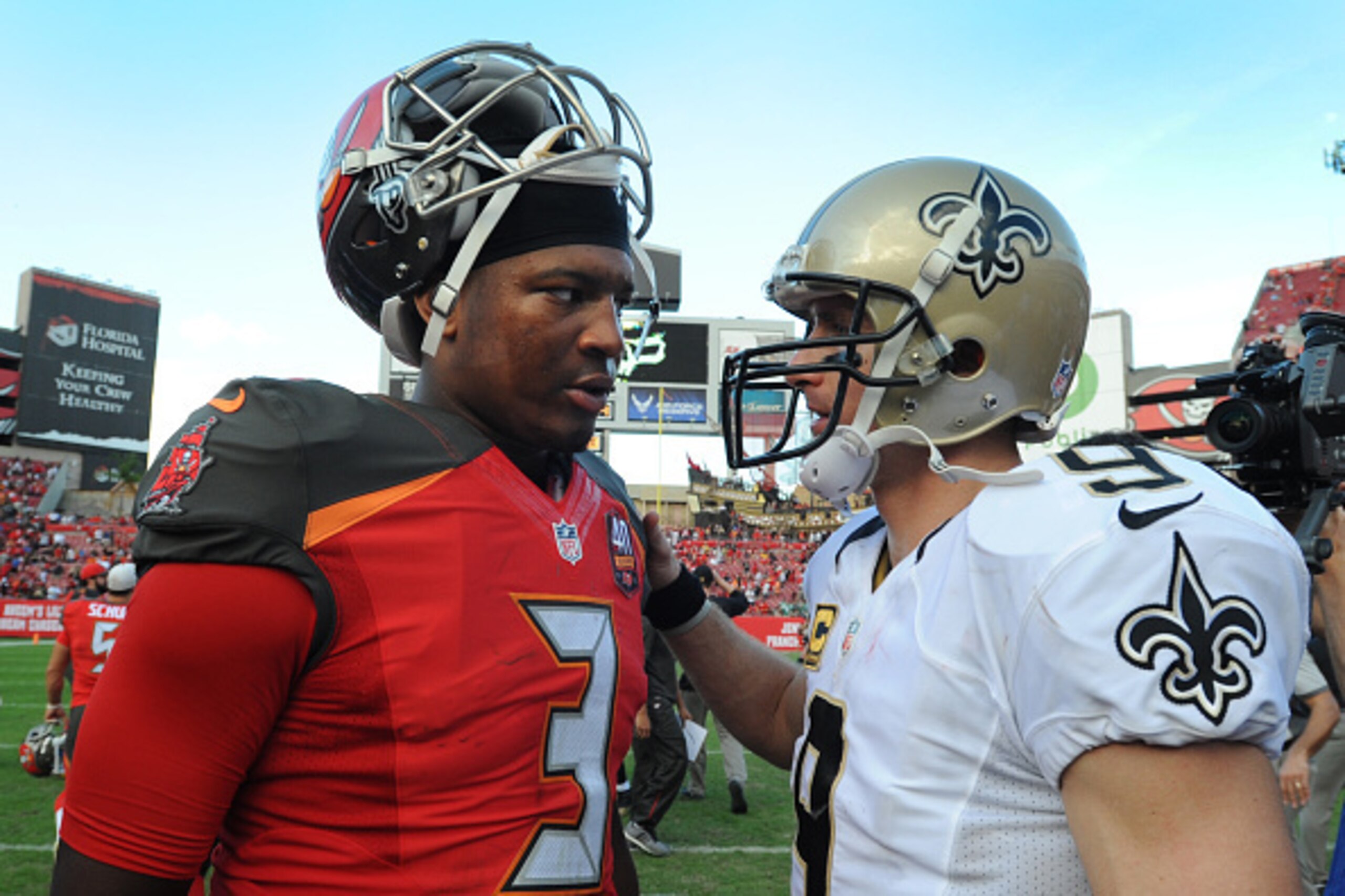 TAMPA, FL - DECEMBER 13: Quarterback Jameis Winston #3 of the Tampa Bay Buccaneers talks with quarterback Drew Brees #9 of the New Orleans Saints after the game at Raymond James Stadium on December 13, 2015 in Tampa, Florida. (Photo by Cliff McBride/Getty