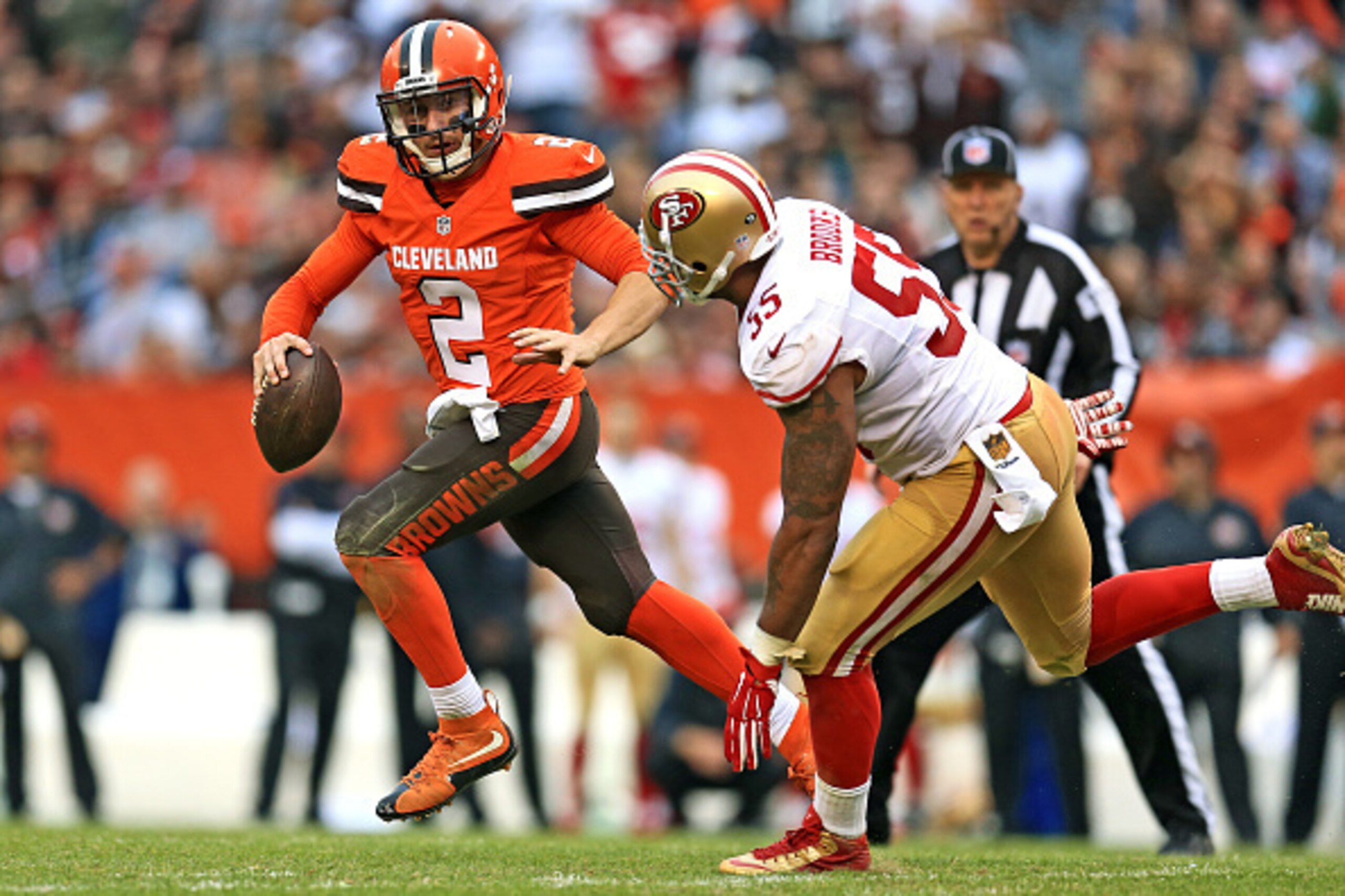 CLEVELAND, OH - DECEMBER 13: Quarterback Johnny Manziel #2 of the Cleveland Browns runs away from outside linebacker Ahmad Brooks #55 of the San Francisco 49ers during the fourth quarter at FirstEnergy Stadium on December 13, 2015 in Cleveland, Ohio. (Pho