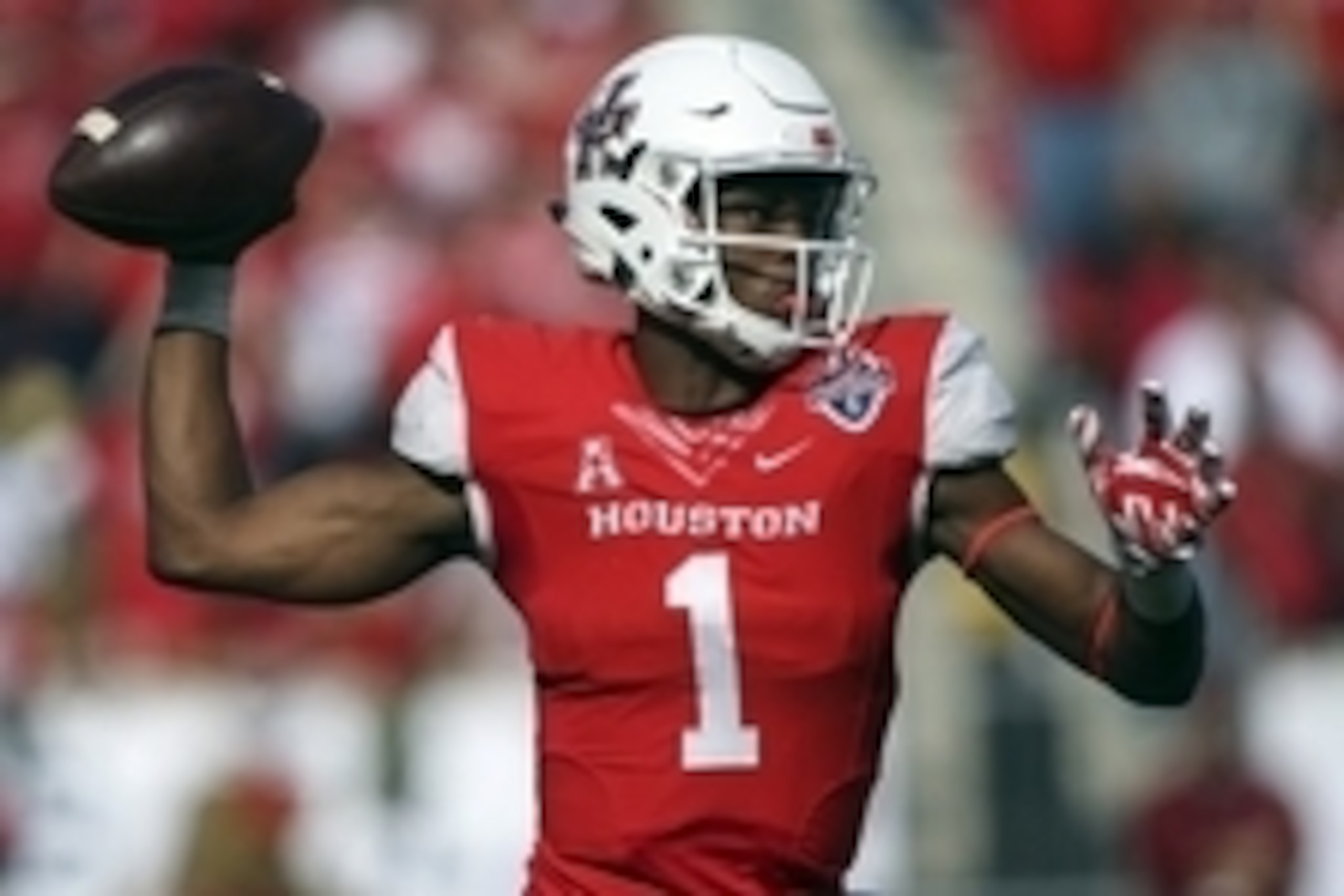 Dec 5, 2015; Houston, TX, USA; Houston Cougars quarterback Greg Ward Jr. (1) attempts a pass during the second half against the Temple Owls in the Mid-American Conference football championship game at TDECU Stadium. The Cougars defeated the Owls 24-13. Ma