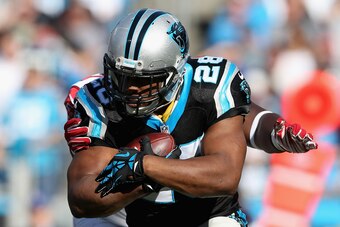 CHARLOTTE, NC - DECEMBER 13:  Jonathan Stewart #28 of the Carolina Panthers runs the ball against the Atlanta Falcons in the 1st half during their game at Bank of America Stadium on December 13, 2015 in Charlotte, North Carolina.  (Photo by Streeter Lecka
