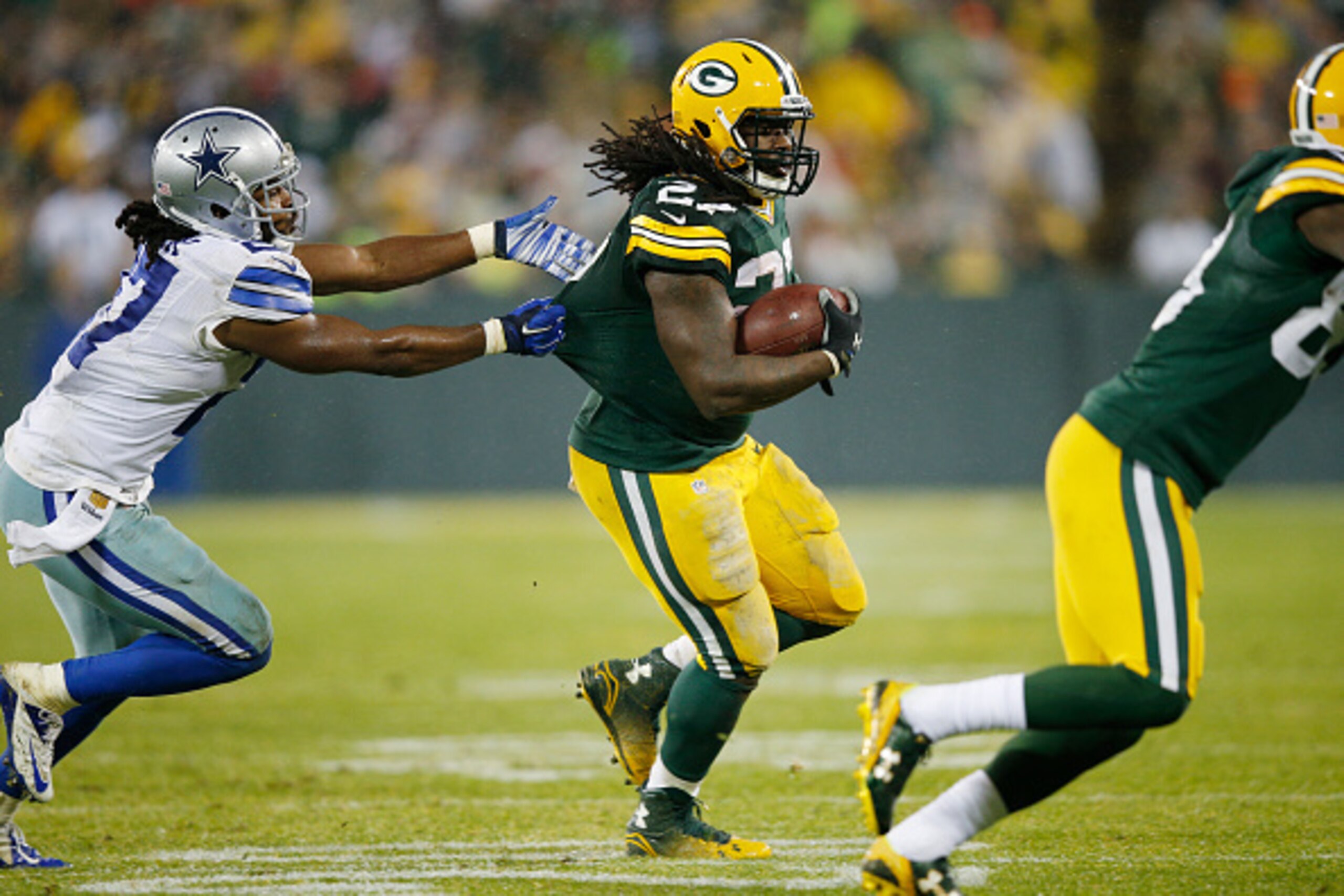 GREEN BAY, WI - DECEMBER 13: Eddie Lacy #27 of the Green Bay Packers runs the ball against the Dallas Cowboys during the game at Lambeau Field on December 13, 2015 in Green Bay, Wisconsin. The Packers defeated the Cowboys 28-7. (Photo by Joe Robbins/Getty
