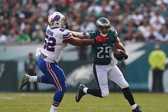 PHILADELPHIA, PA - DECEMBER 13: DeMarco Murray #29 of the Philadelphia Eagles carries the ball against Preston Brown #52 of the Buffalo Bills during the first quarter at Lincoln Financial Field on December 13, 2015 in Philadelphia, Pennsylvania.  (Photo b