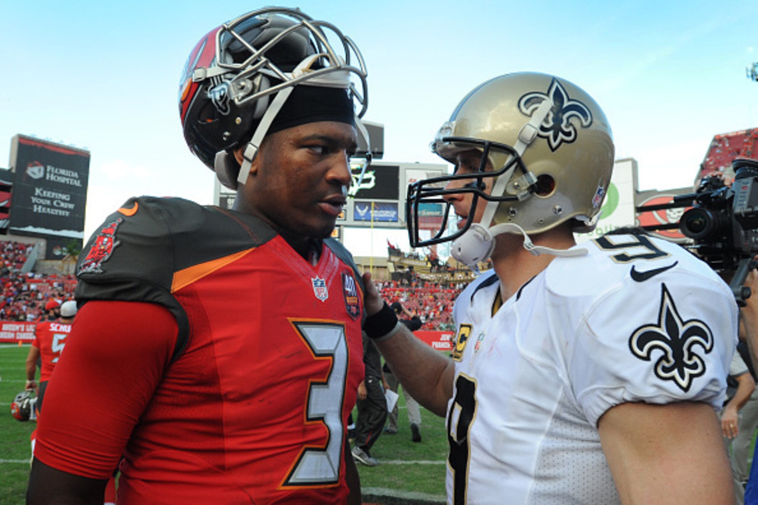 TAMPA, FL - DECEMBER 13: Quarterback Jameis Winston #3 of the Tampa Bay Buccaneers talks with quarterback Drew Brees #9 of the New Orleans Saints after the game at Raymond James Stadium on December 13, 2015 in Tampa, Florida. (Photo by Cliff McBride/Getty