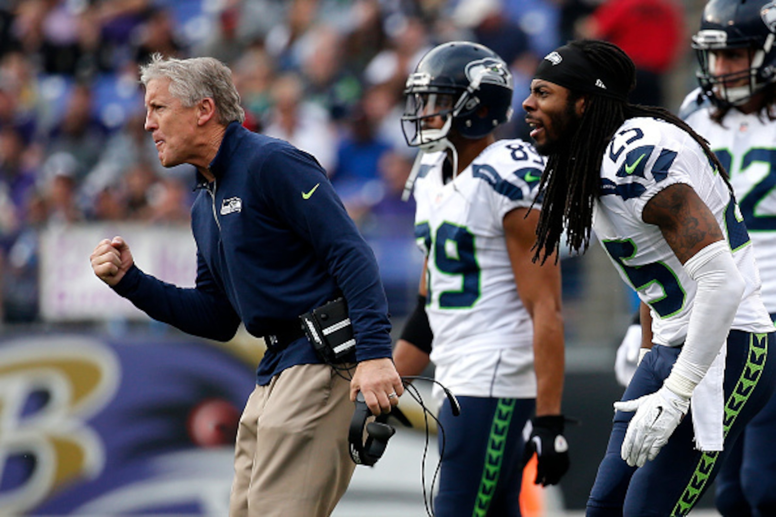 BALTIMORE, MD - DECEMBER 13: Head coach Pete Carroll of the Seattle Seahawks and cornerback Richard Sherman #25 of the Seattle Seahawks react to a play against the Baltimore Ravens in the third quarter at M&T Bank Stadium on December 13, 2015 in Baltimore