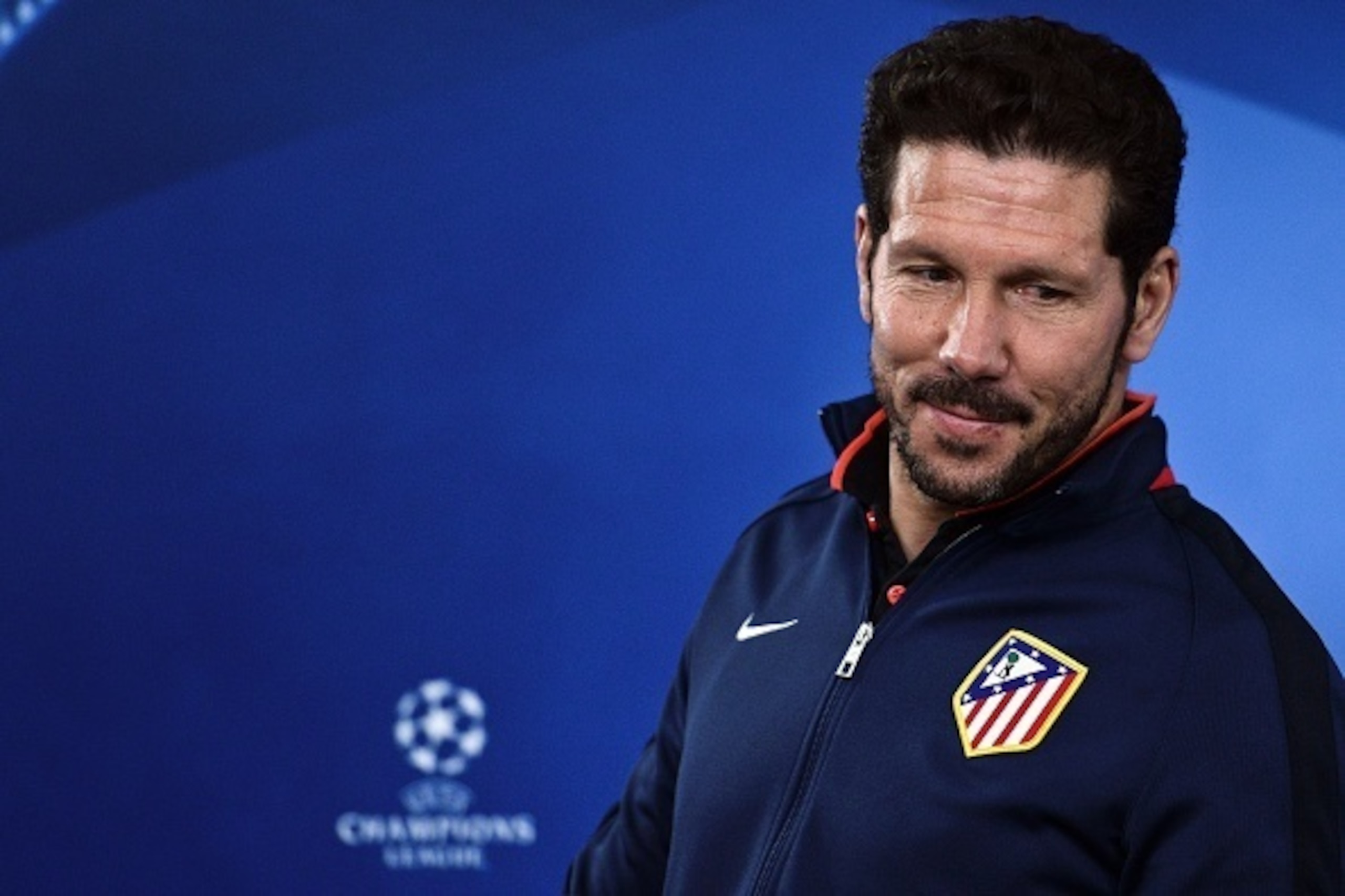 Atletico Madrid's head coach Diego Simeone arrives to give a press conference at Luz stadium in Lisbon, on December 7, 2015 on the eve of the UEFA Champions League Group C football match between SL Benfica vs Atletico de Madrid.   AFP PHOTO / PATRICIA DE 