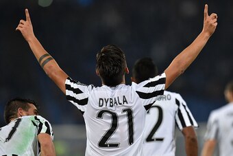 ROME, ITALY - DECEMBER 04:  Paulo Dybala of Juventus FC celebrates after scoring goal 0-2 during the Serie A match between SS Lazio and Juventus FC at Stadio Olimpico on December 4, 2015 in Rome, Italy.  (Photo by Giuseppe Bellini/Getty Images)