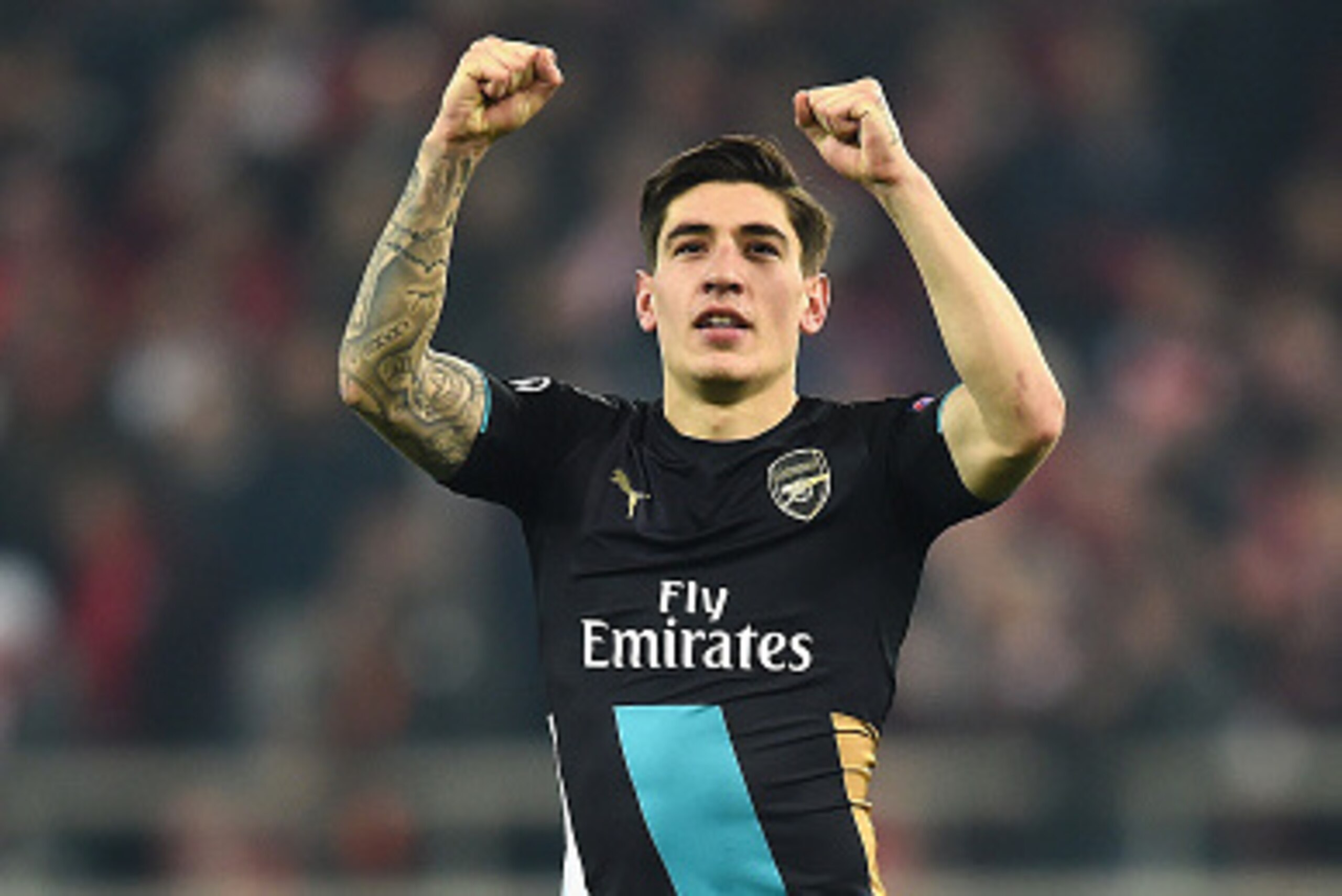 PIRAEUS, GREECE - DECEMBER 09:  Hector Bellerin  of Arsenal celebrates at the end of Arsenal's win in the UEFA Champions League Group F match between Olympiacos FC and Arsenal FC at Karaiskakis Stadium on December 9, 2015 in Piraeus, Greece.  (Photo by Mi