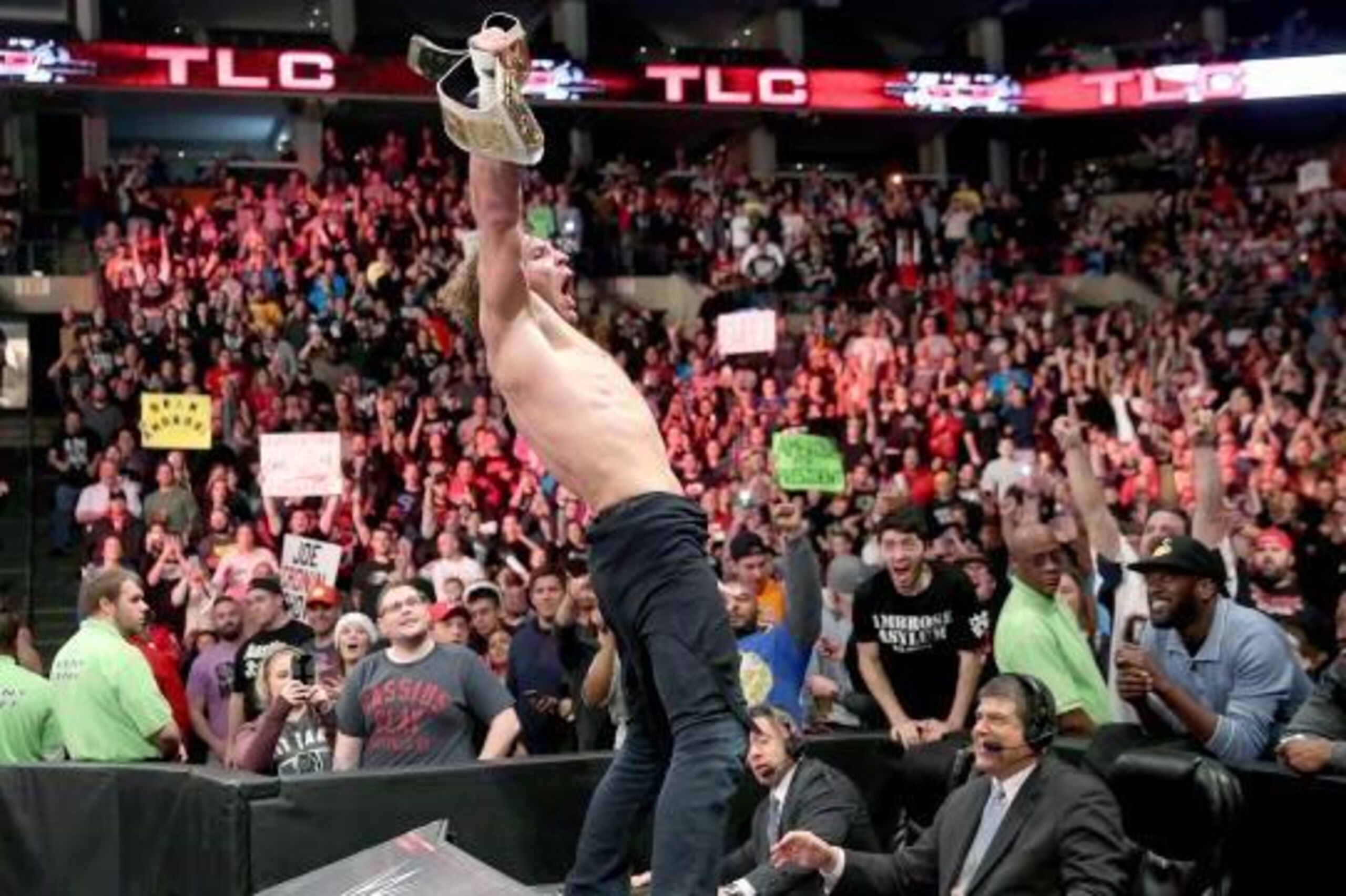 Dean Ambrose celebrates his win over Kevin Owens.