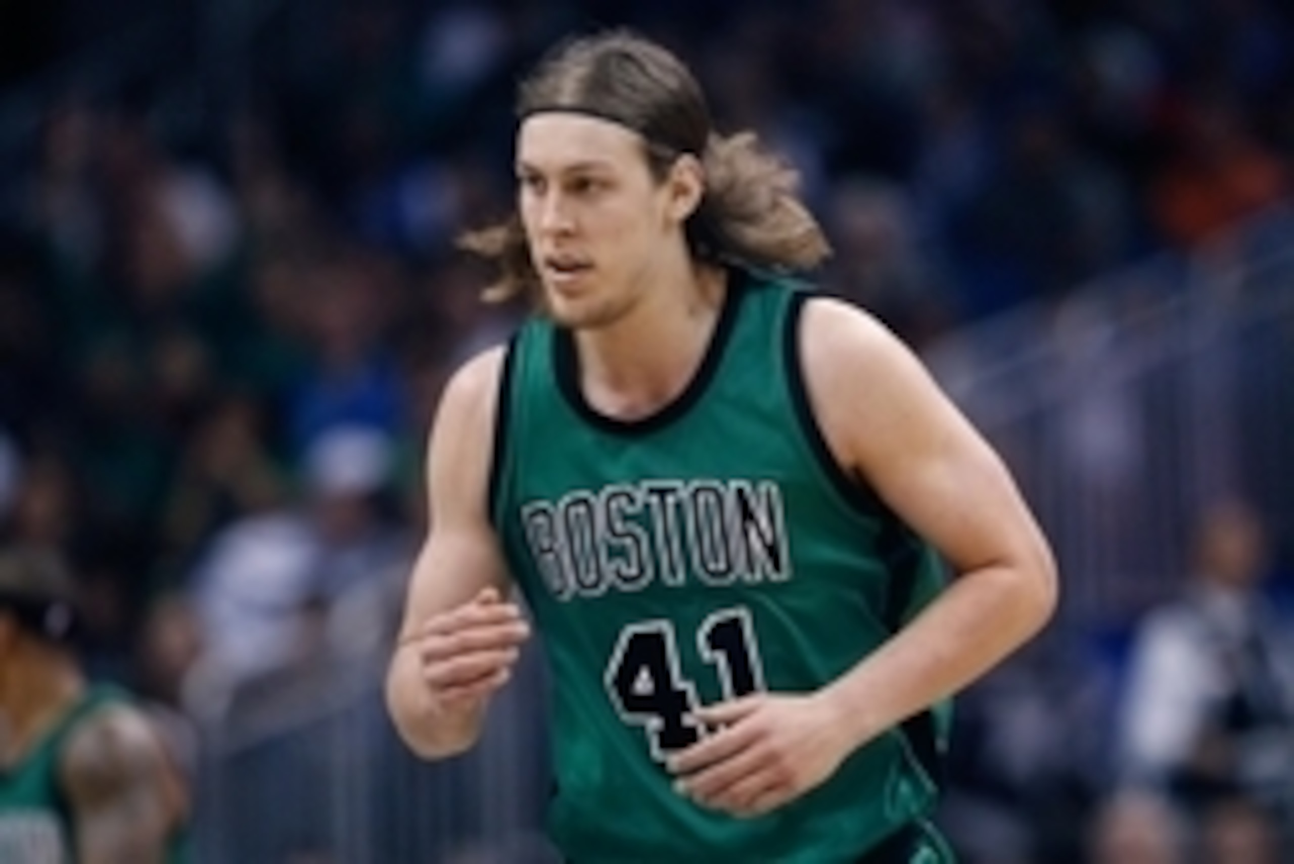 Nov 29, 2015; Orlando, FL, USA; Boston Celtics center Kelly Olynyk (41) runs down court during the second half of a basketball game against the Orlando Magic at Amway Center. Mandatory Credit: Reinhold Matay-USA TODAY Sports