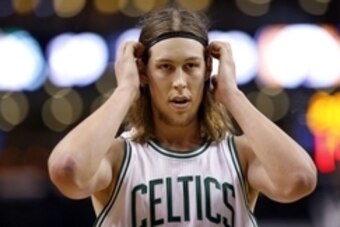 Nov 11, 2015; Boston, MA, USA; Boston Bruins center Kelly Olynyk (41) adjusts his head band during the first quarter against the Indiana Pacers at TD Garden. Mandatory Credit: Greg M. Cooper-USA TODAY Sports