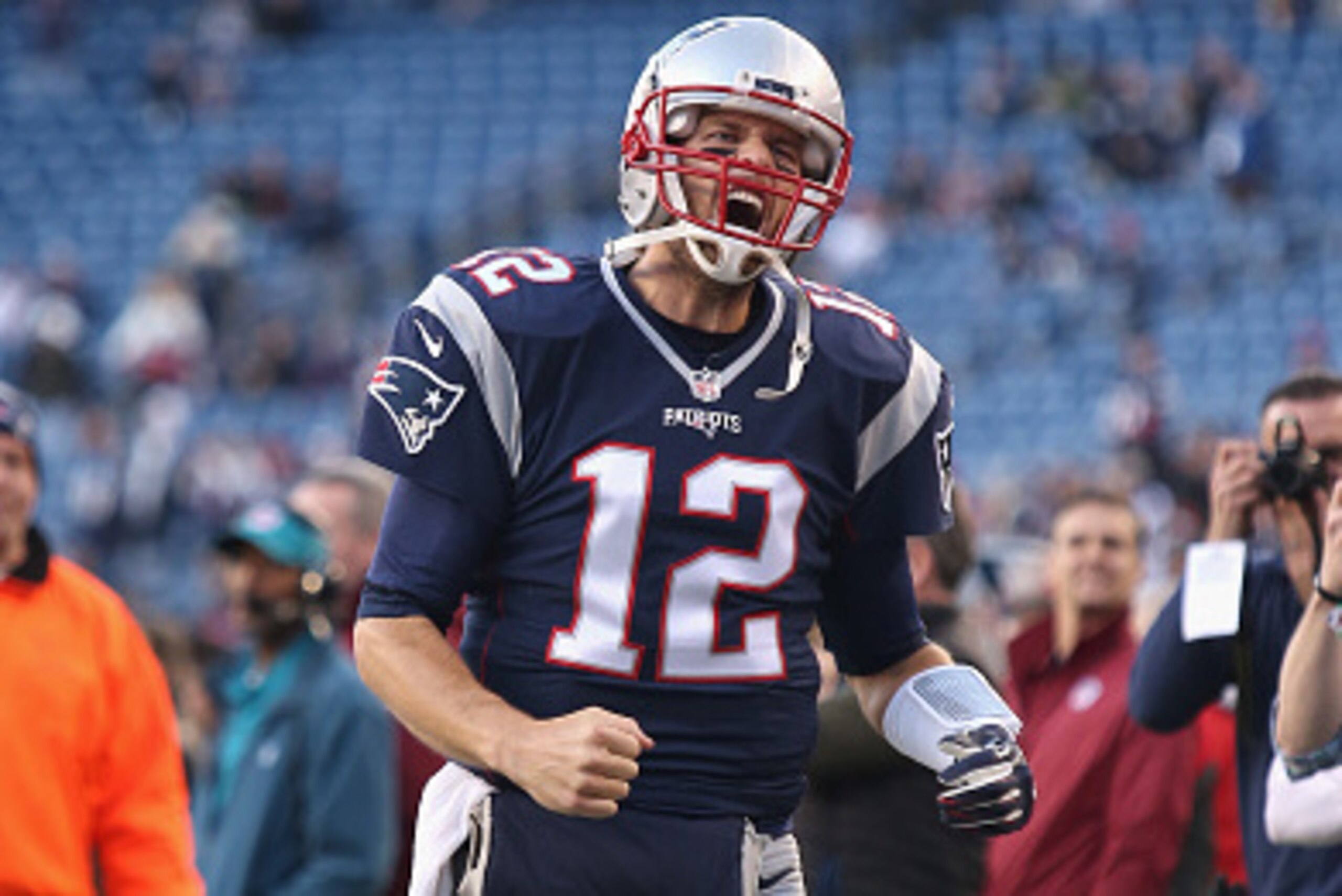 FOXBORO, MA - DECEMBER 06:  Tom Brady #12 of the New England Patriots reacts prior to the game between the New England Patriots and the Philadelphia Eagles at Gillette Stadium on December 6, 2015 in Foxboro, Massachusetts.  (Photo by Tim Bradbury/Getty Im