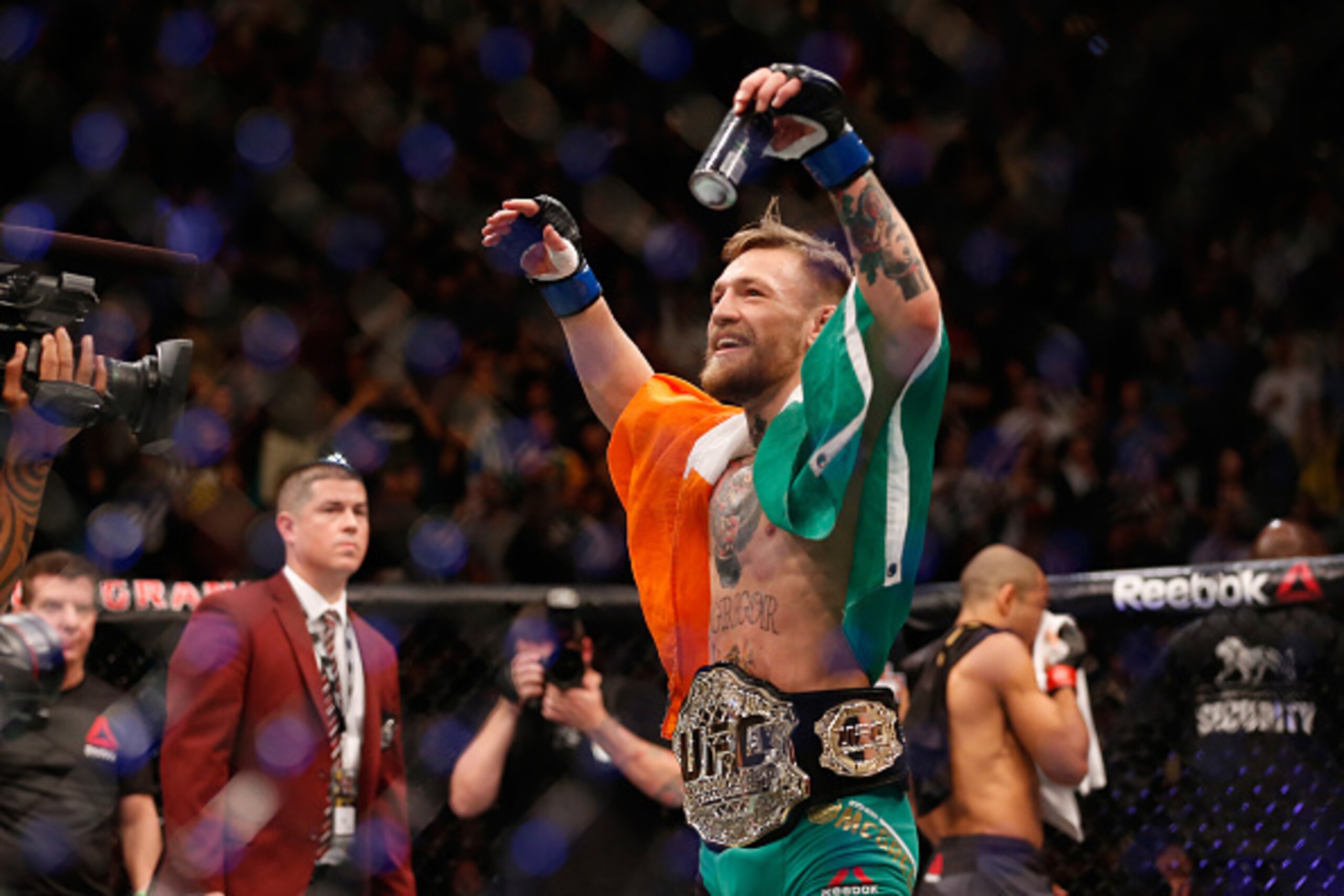 LAS VEGAS, NV - DECEMBER 12: Conor McGregor of Ireland reacts to his victory over Jose Aldo of Brazil in their UFC featherweight championship bout during the UFC 194 event inside MGM Grand Garden Arena on December 12, 2015 in Las Vegas, Nevada.  (Photo by