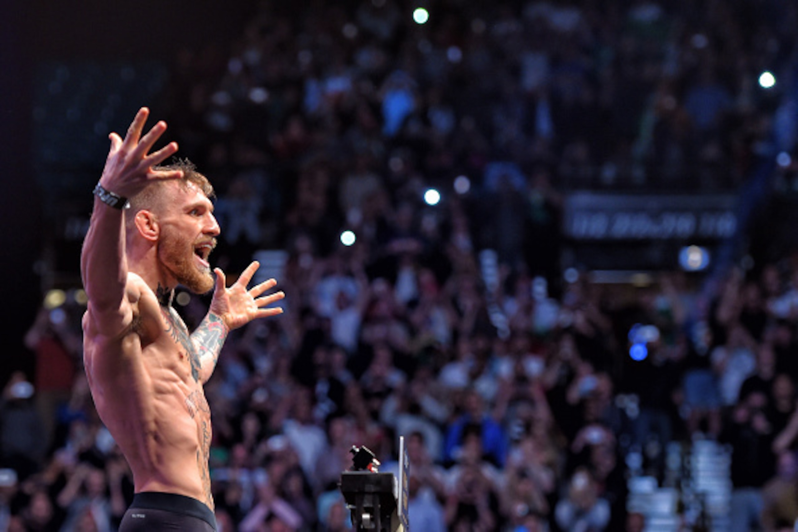LAS VEGAS, NEVADA - DECEMBER 11:  Conor McGregor of Ireland steps on the scale during the UFC 194 Weigh-in event at the MGM Grand Garden Arena on December 11, 2015 in Las Vegas, Nevada.  (Photo by Jeff Bottari/Zuffa LLC/Zuffa LLC via Getty Images)
