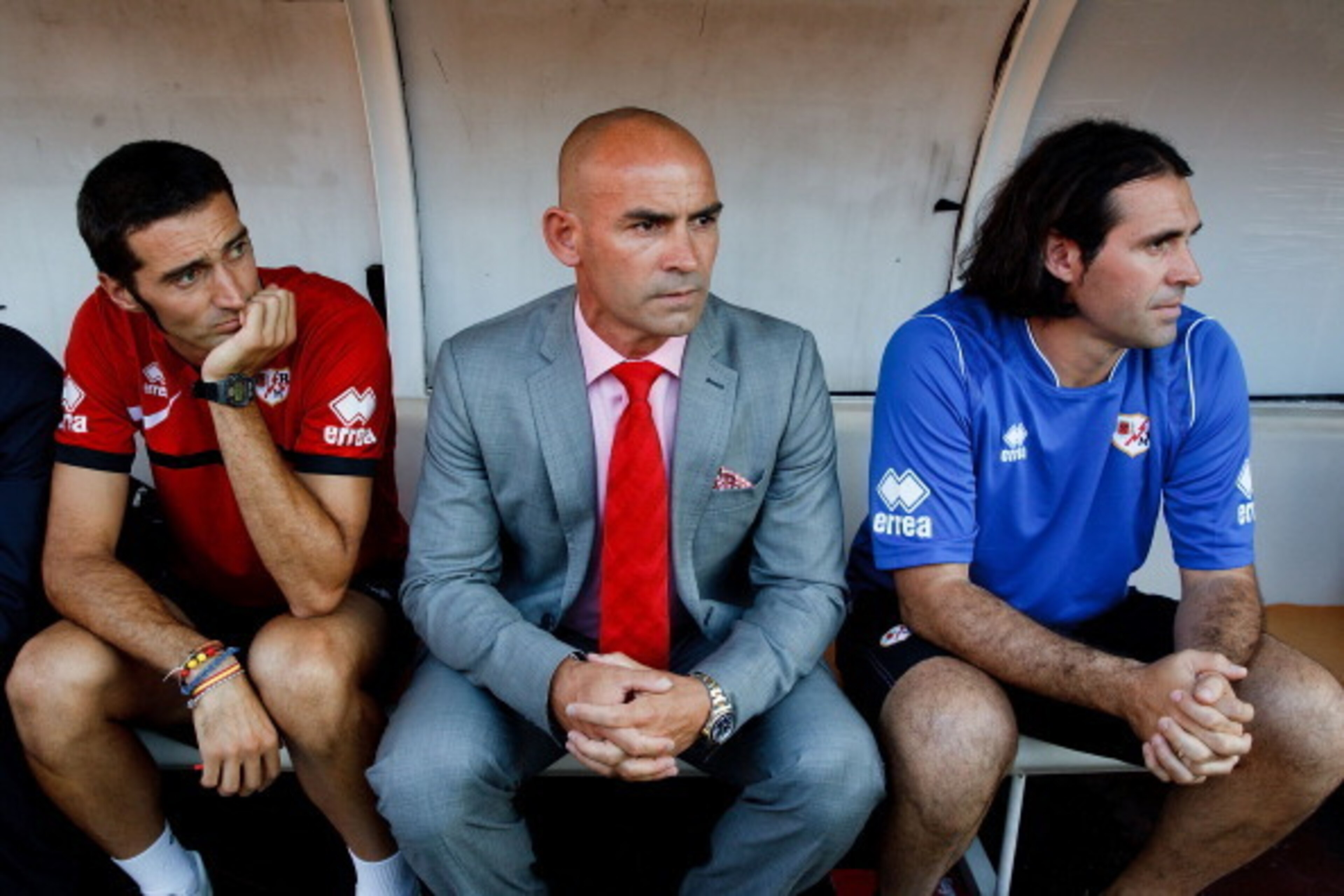 MADRID, SPAIN - AUGUST 19: head coach Paco Jemez of Rayo Vallecano de Madrid sitted on the bench with his technical staff prior to start the La Liga match between Rayo Vallecano de Madrid and Elche FC at Estadio Teresa Rivero on August 19, 2013 in Madrid MADRID, SPAIN - AUGUST 19: head coach Paco Jemez of Rayo Vallecano de Madrid sitted on the bench with his technical staff prior to start the La Liga match between Rayo Vallecano de Madrid and Elche FC at Estadio Teresa Rivero on August 19, 2013 in Madrid
