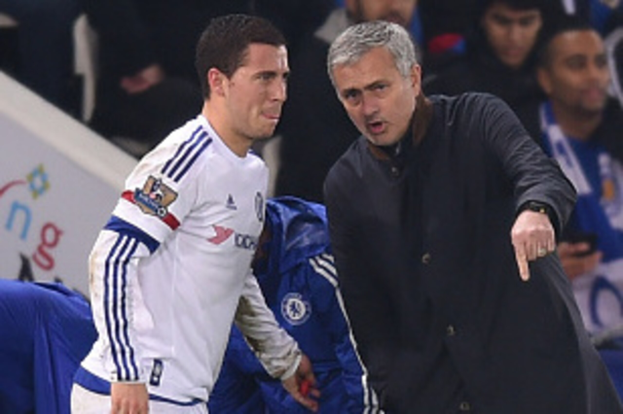 LEICESTER, ENGLAND - DECEMBER 14:  Jose Mourinho the manager of Chelsea speaks with Eden Hazard of Chelsea as he receives medical treatment during the Barclays Premier League match between Leicester City and Chelsea at the King Power Stadium on December14
