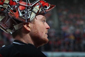 NEWARK, NJ - DECEMBER 11: Cory Schneider #35 of the New Jersey Devils takes a break during the game against the Detroit Red Wings at the Prudential Center on December 11, 2015 in Newark, New Jersey. The Devils defeated the Red Wings 3-2 in overtime.  (Pho