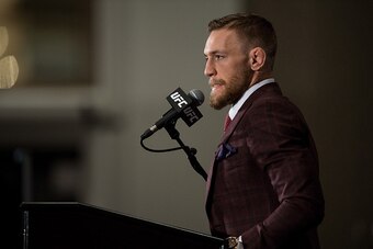 LAS VEGAS, NV - DECEMBER 12:  UFC featherweight champion Conor McGregor speaks to the media at the post fight press conference after his 13 second knockout victory over Jose Aldo in their featherweight championship fight during the UFC 194 event inside MG