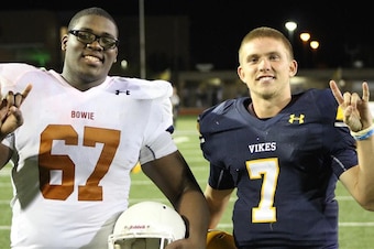 Offensive tackle Tope Imade and quarterback Shane Buechele. Competitors this year, teammates at Texas next year.