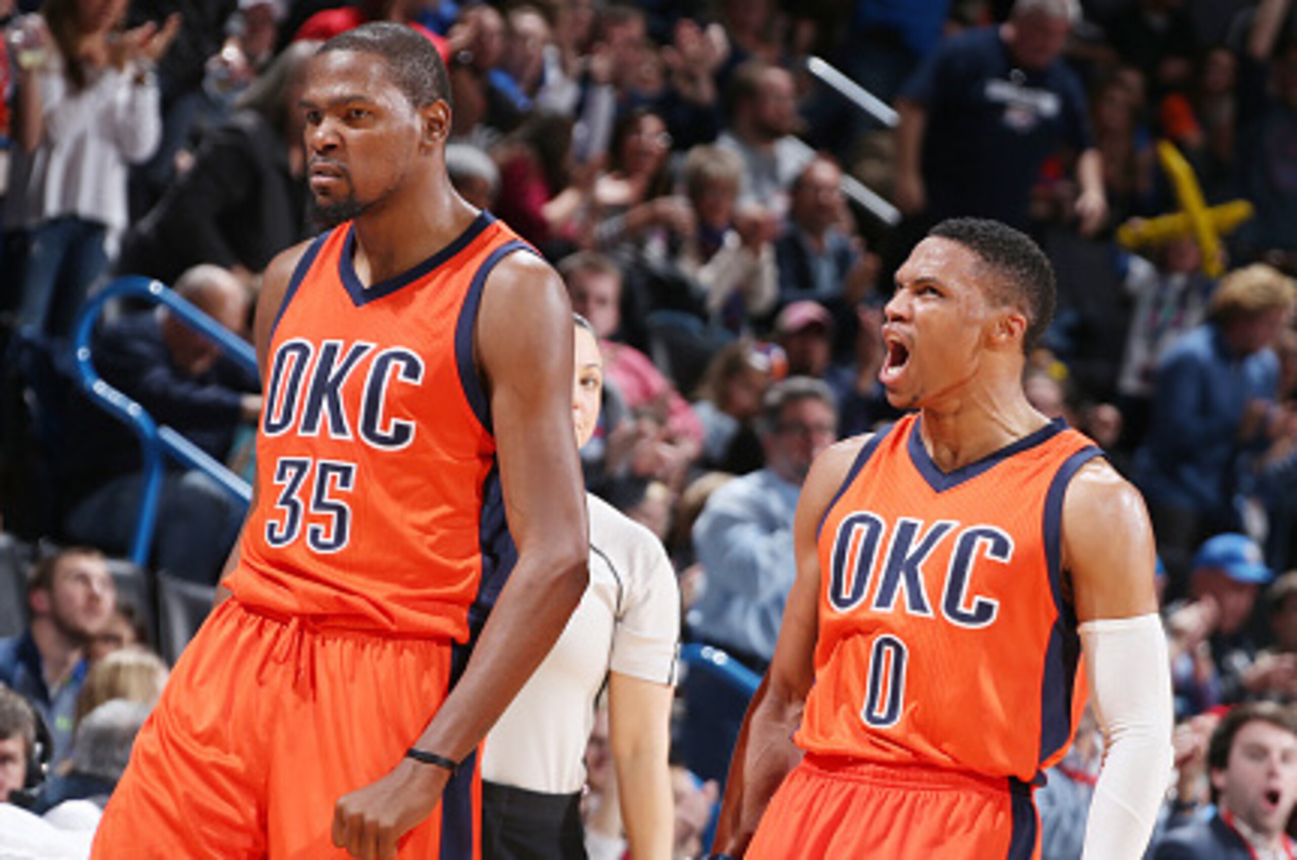 OKLAHOMA CITY, OK- DECEMBER 13:  Kevin Durant #35 of the Oklahoma City Thunder and Russell Westbrook #0 of the Oklahoma City Thunder celebrate during the game against the Utah Jazz on December 13, 2015 at Chesapeake Energy Arena in Oklahoma City, Oklahoma