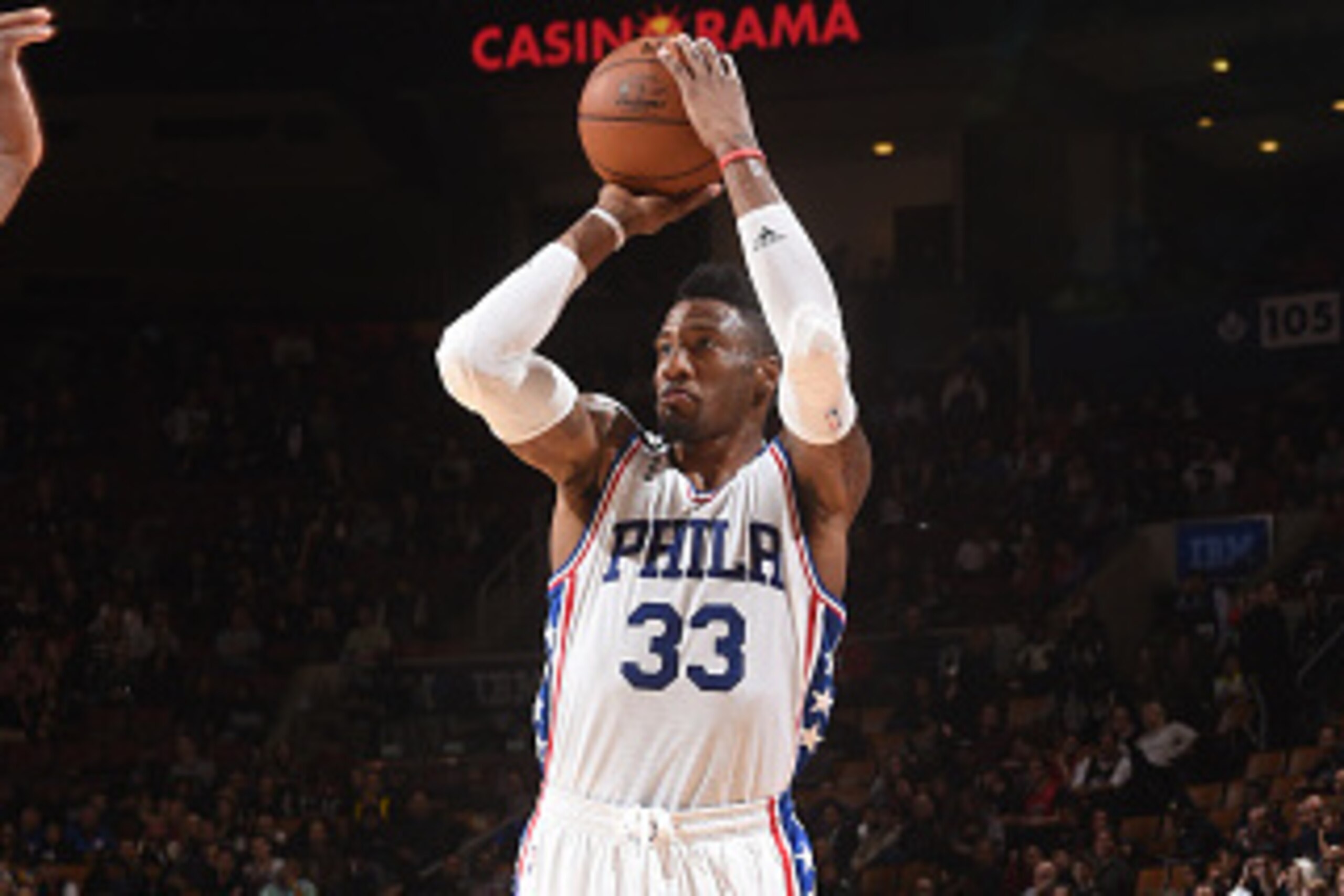 TORONTO, CANADA - DECEMBER 13:  Robert Covington #33 of the Philadelphia 76ers shoots the ball against the Toronto Raptors on December 13, 2015 at the Air Canada Centre in Toronto, Ontario, Canada.  NOTE TO USER: User expressly acknowledges and agrees tha