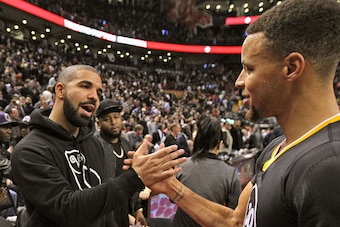 TORONTO, ON - DECEMBER 5:  Drake and Stephen Curry #30 of the Golden State Warriors after the game against the Toronto Raptors on December 5, 2015 at Air Canada Centre in Toronto, Ontario, Canada. NOTE TO USER: User expressly acknowledges and agrees that,