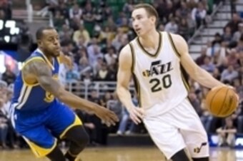 Nov 30, 2015; Salt Lake City, UT, USA; Utah Jazz forward Gordon Hayward (20) dribbles the ball in front of Golden State Warriors forward Andre Iguodala (9) during the second half at Vivint Smart Home Arena. The Warriors won 106-103. Mandatory Credit: Russ