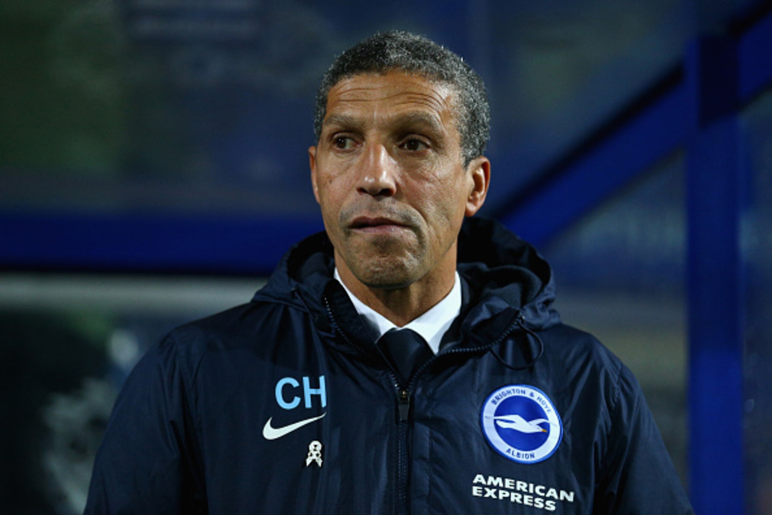 LONDON, ENGLAND - DECEMBER 15:  Brighton manager Chris Hughton looks on before kick off during the Sky Bet Championship match between Queens Park Rangers and Brighton and Hove Albion at Loftus Road on December 15, 2015 in London, United Kingdom.  (Photo b
