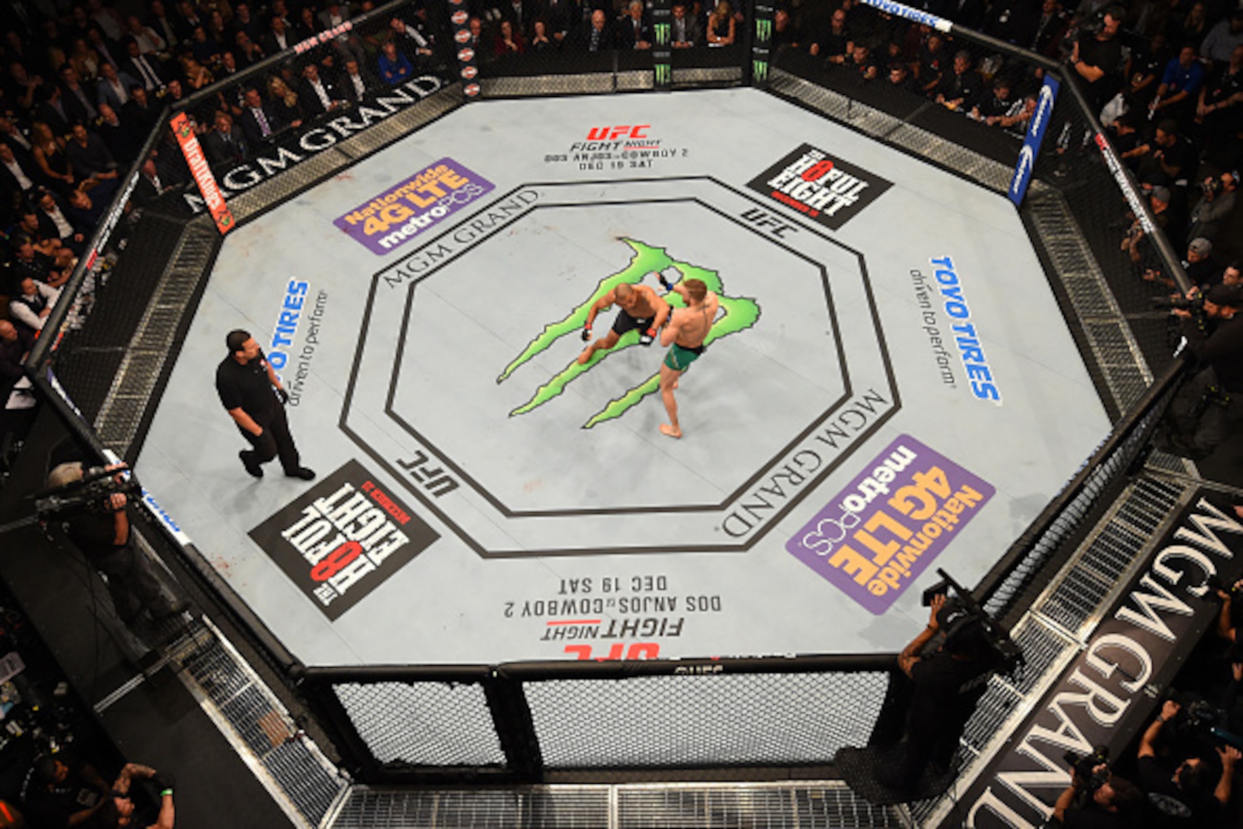 LAS VEGAS, NV - DECEMBER 12:  An overhead view of the Octagon as Conor McGregor of Ireland punches Jose Aldo of Brazil during the UFC 194 event inside MGM Grand Garden Arena on December 12, 2015 in Las Vegas, Nevada.  (Photo by Zuffa LLC/Zuffa LLC via Get